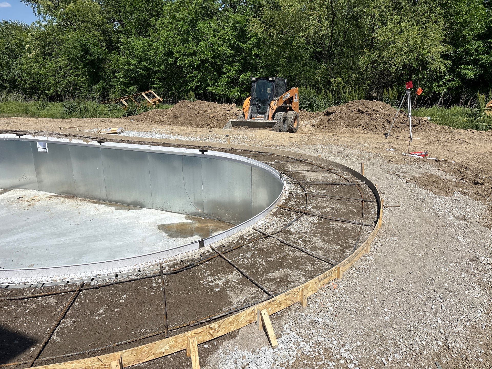 New Residential Construction - Paver, Putting Green, Pool by New Horizon Landscapes