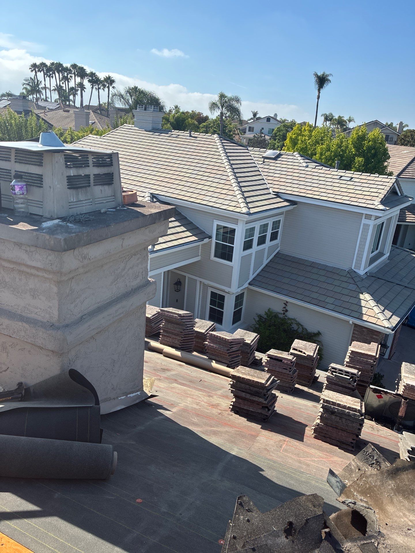 Carlsbad Concrete Tile Roof Replacement with Copper Flashing and Skylights by Reliable Roofing San Diego Inc.