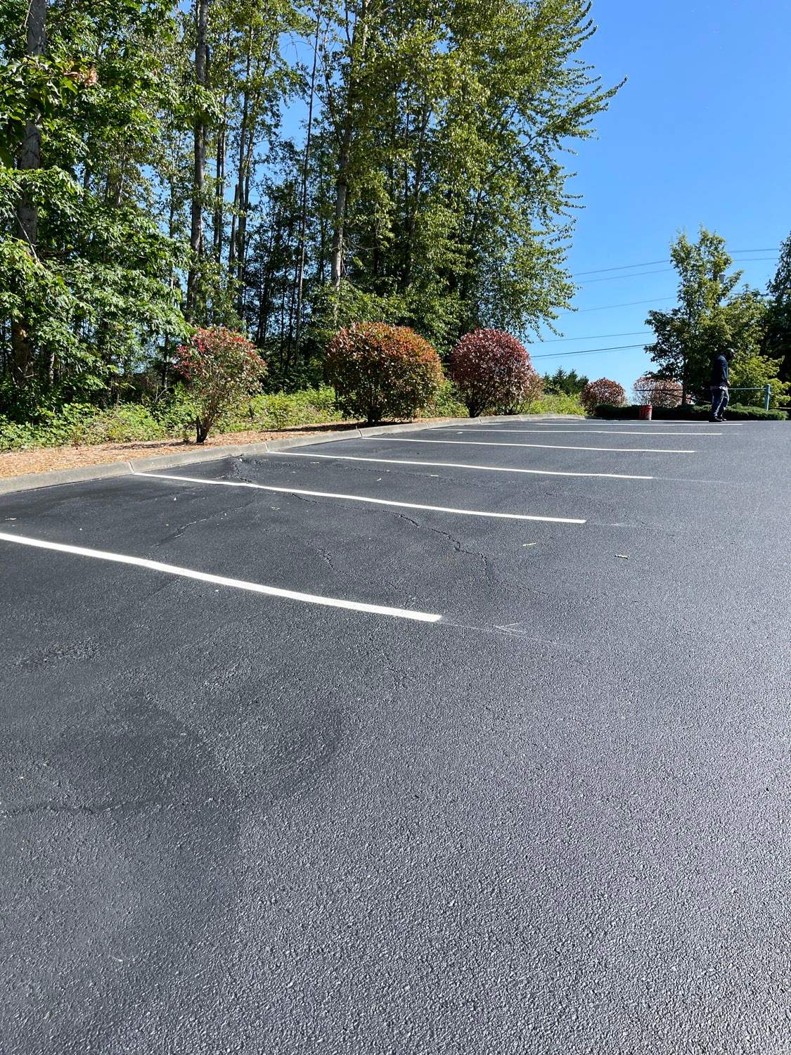 King Machine Business Parking Lot Sealcoat Overlay | Mukilteo by Jireh Asphalt & Concrete Inc 