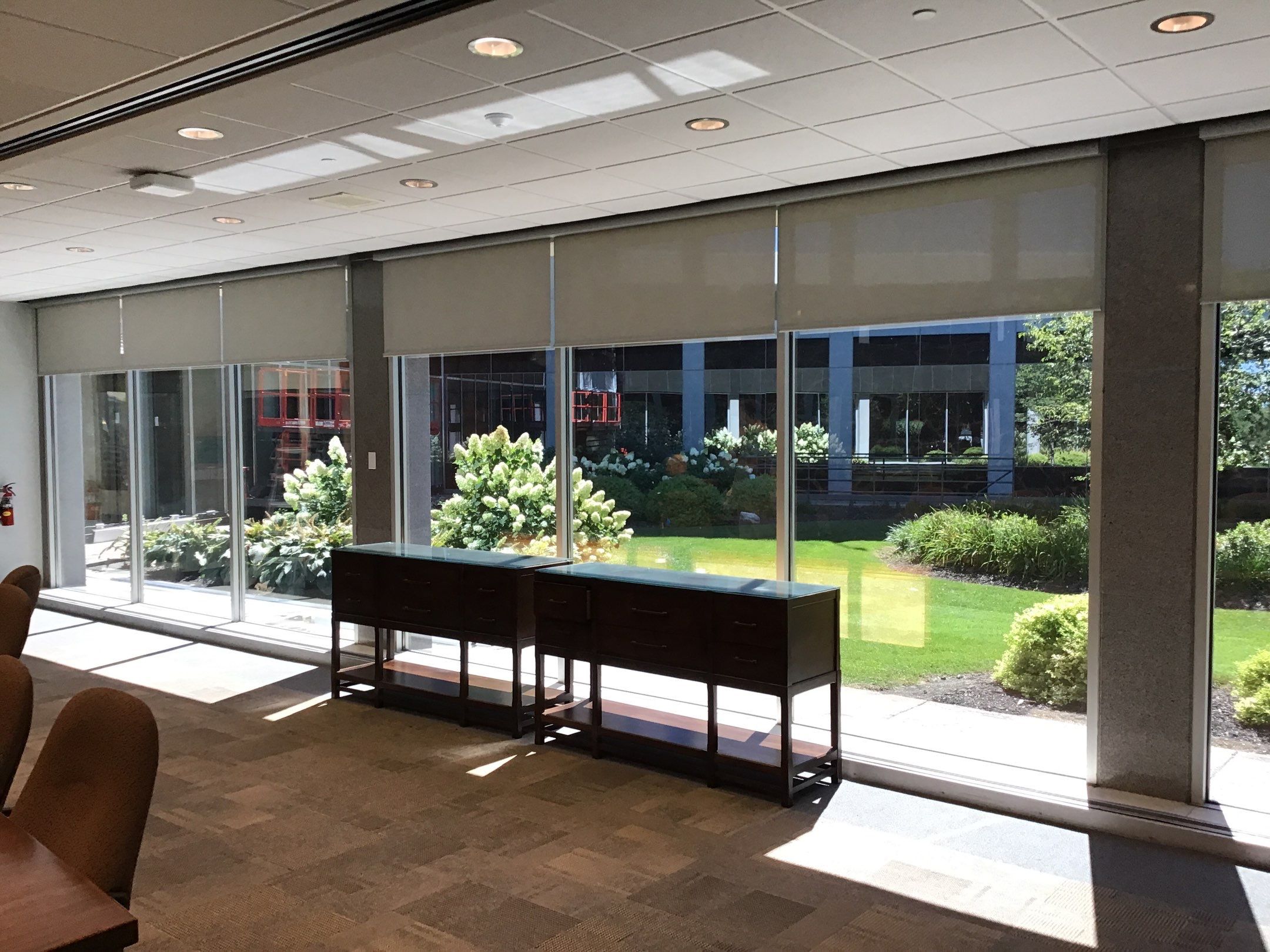 Commercial Window Coverings using Screen Shades by Custom Blinds & Design