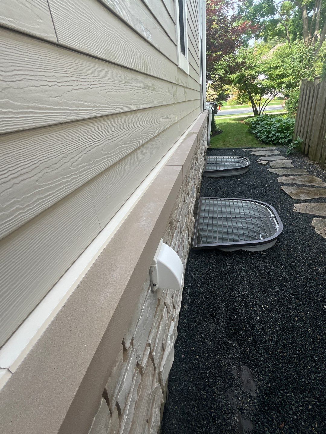 Hardie Board House & Detached Garage Soft Washing by Northern Power Washing LLC.