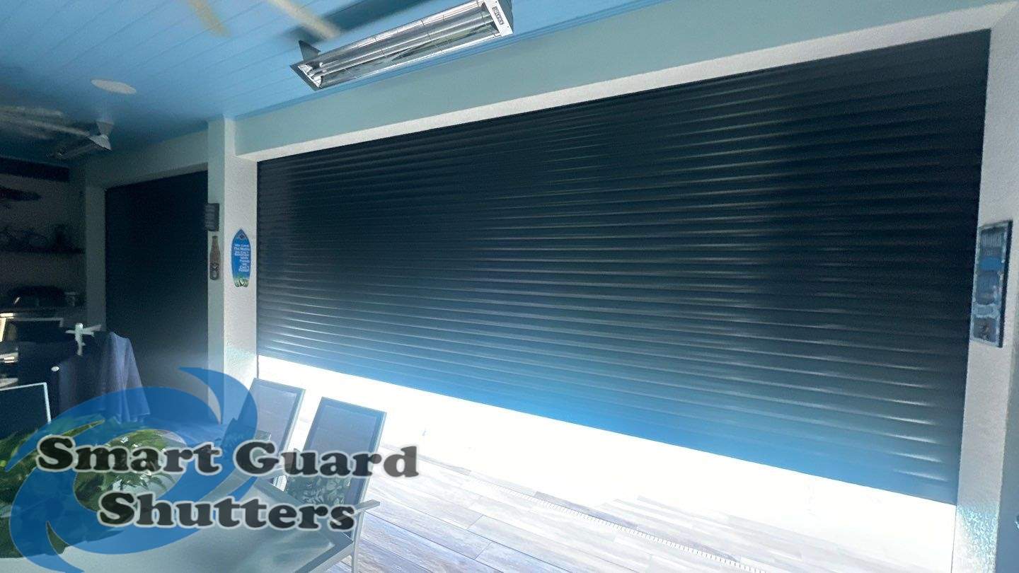 Motorized Rolling Shutter In Bronze by Smart Guard Shutters
