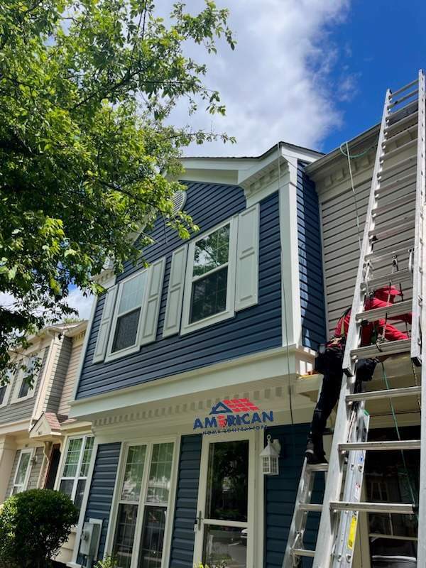 Beautiful in Blue - Mastic Siding Replacement by American Home Contractors