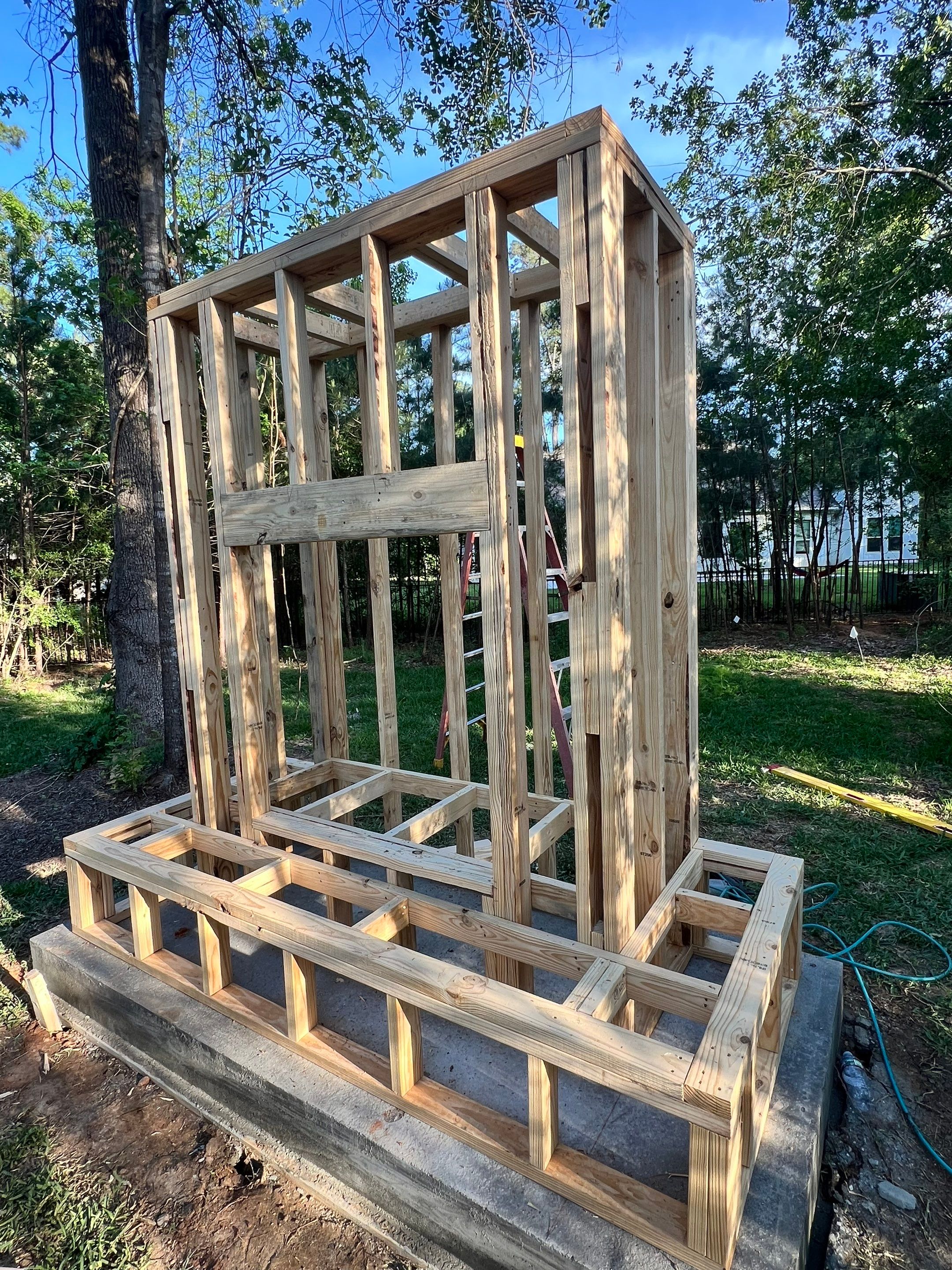 Outdoor Fireplace in Tomball, TX by SophAlx LLC