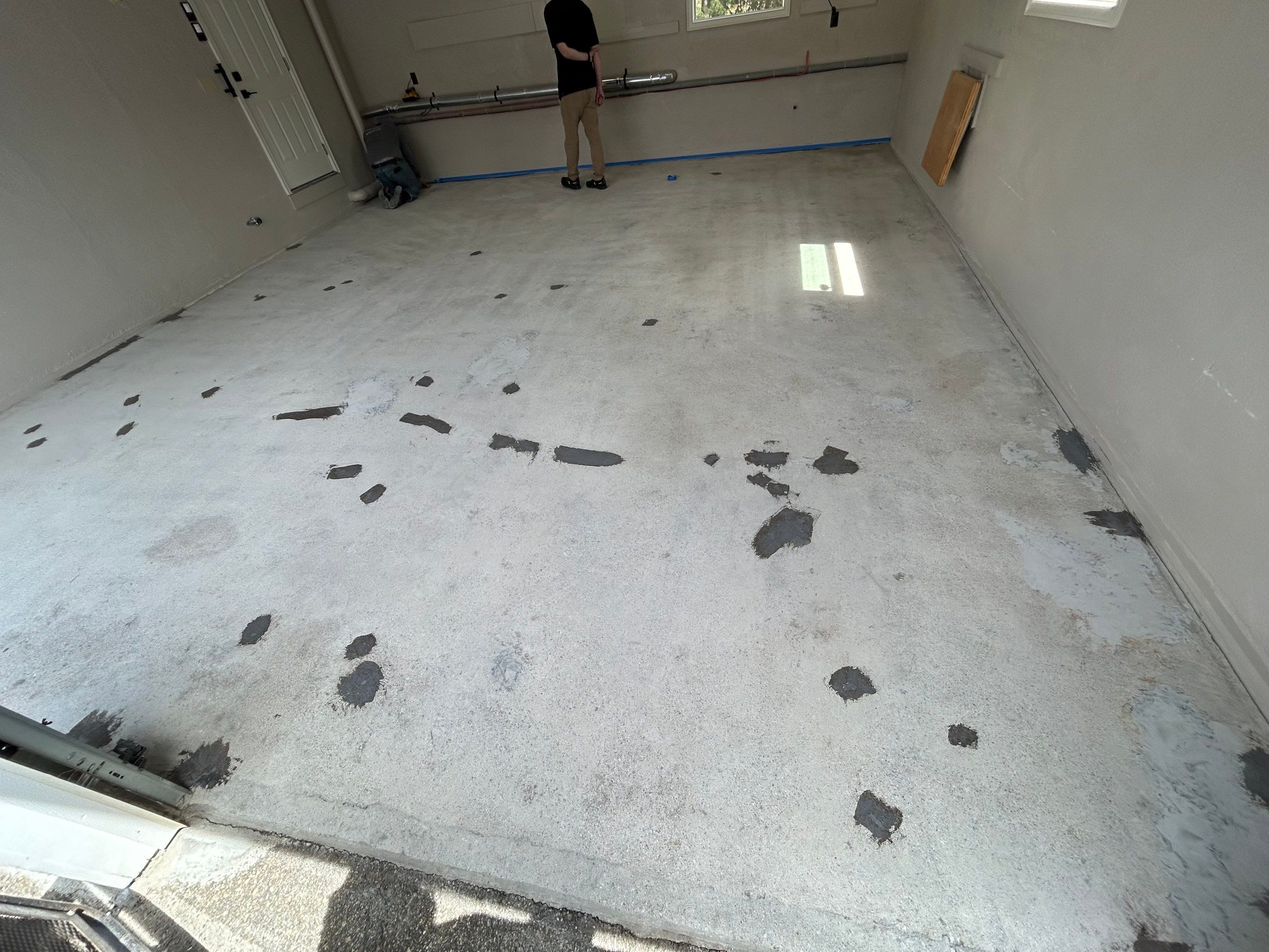 Garage Floor Transformation with Durable Concrete Floor Coating by DiGiorgi Roofing and Siding Inc