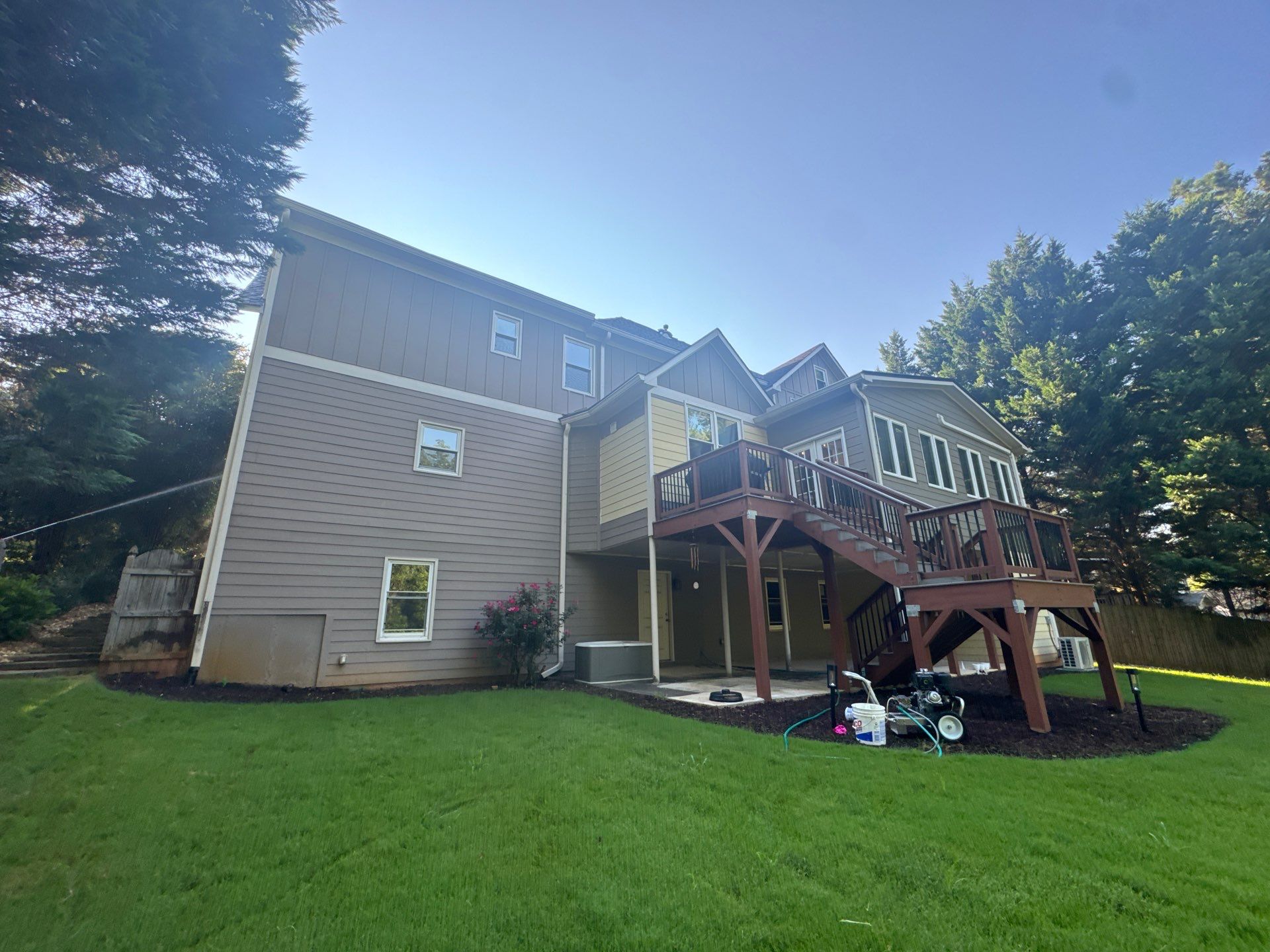 Exterior Modernization Featuring New Siding and Custom Wood Portico by Swift Home Renovations