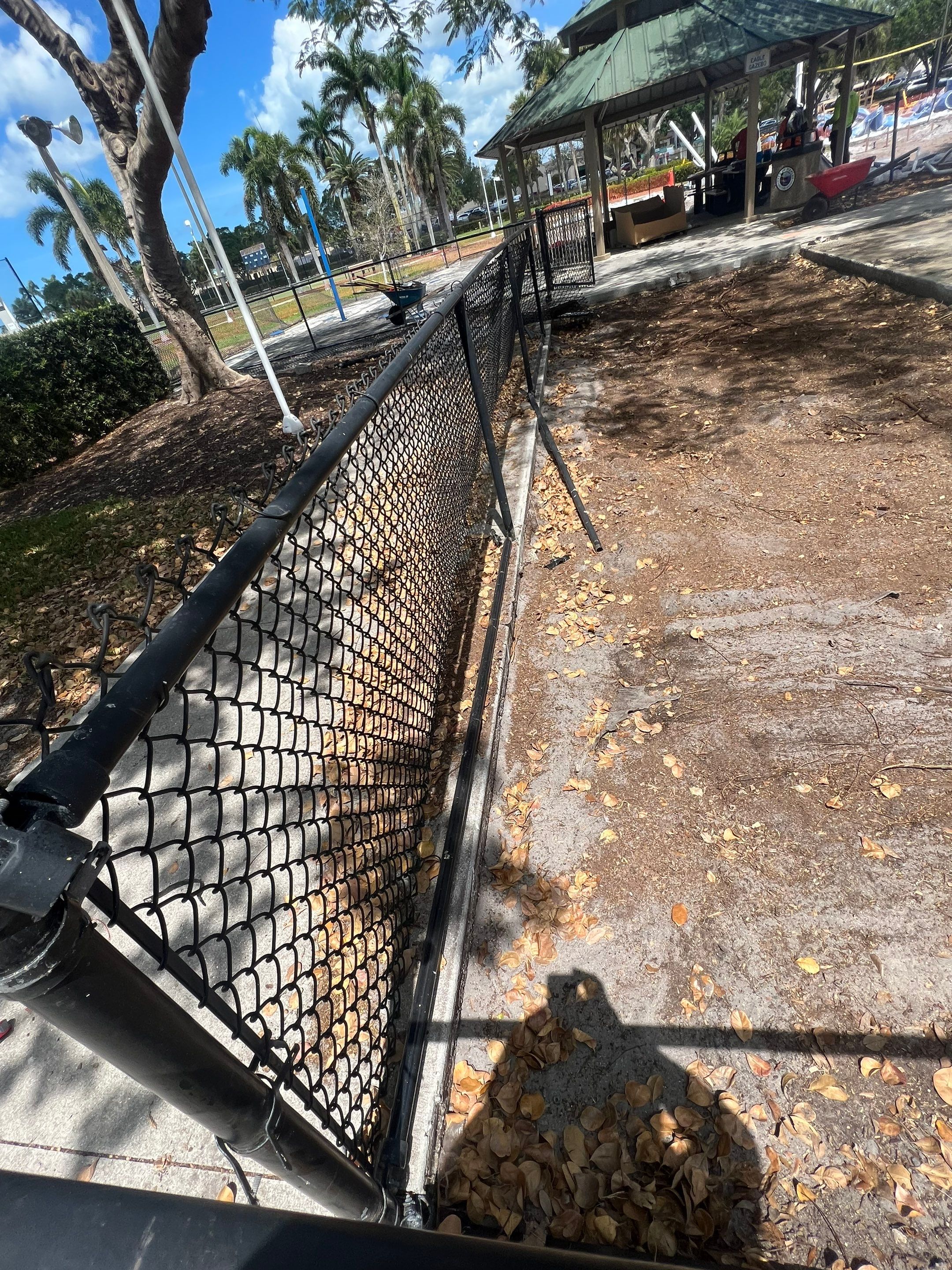 Vinyl Coated Chain-link fence for the City of Naples around Fleischmann Park Playground.  by Asap fence and gates, LLC