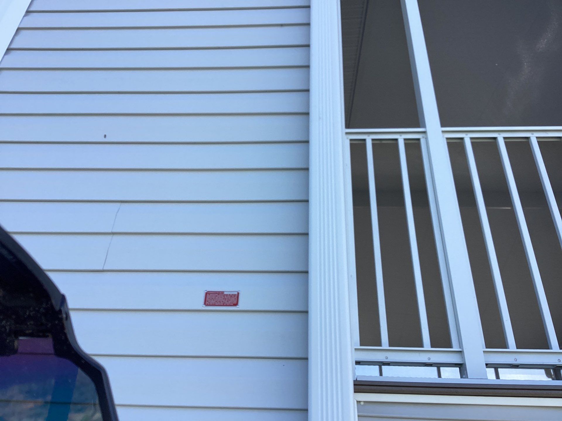 White Downspouts Installation in St. James City by Gutter Professors