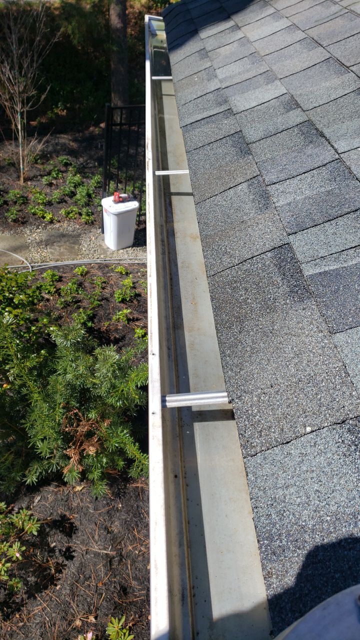 Gutter Cleaning using water by Power Wash Masters LLC
