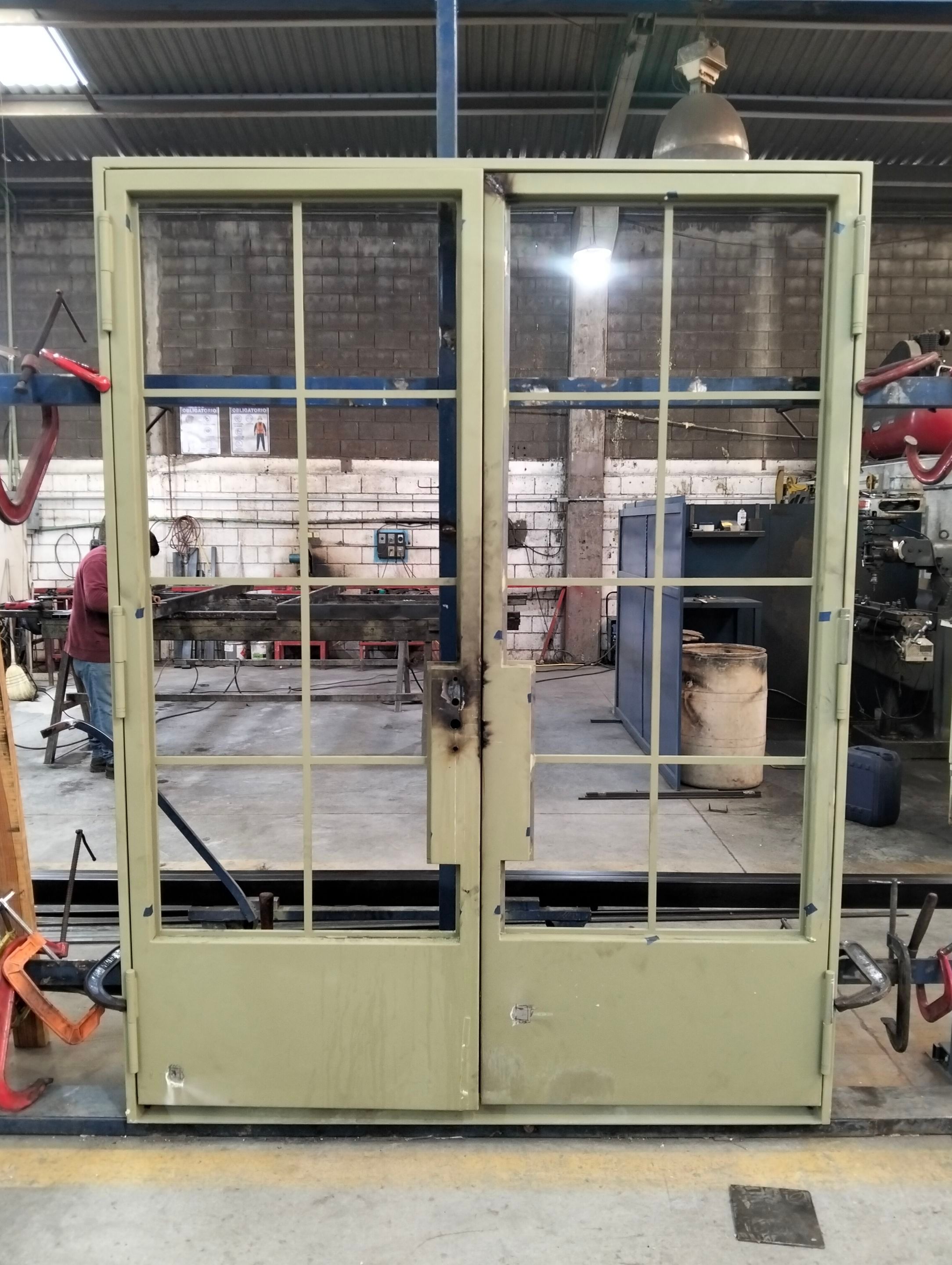 Steel Double Door Installation in Fort Worth in Sage Green by Solara Custom Living