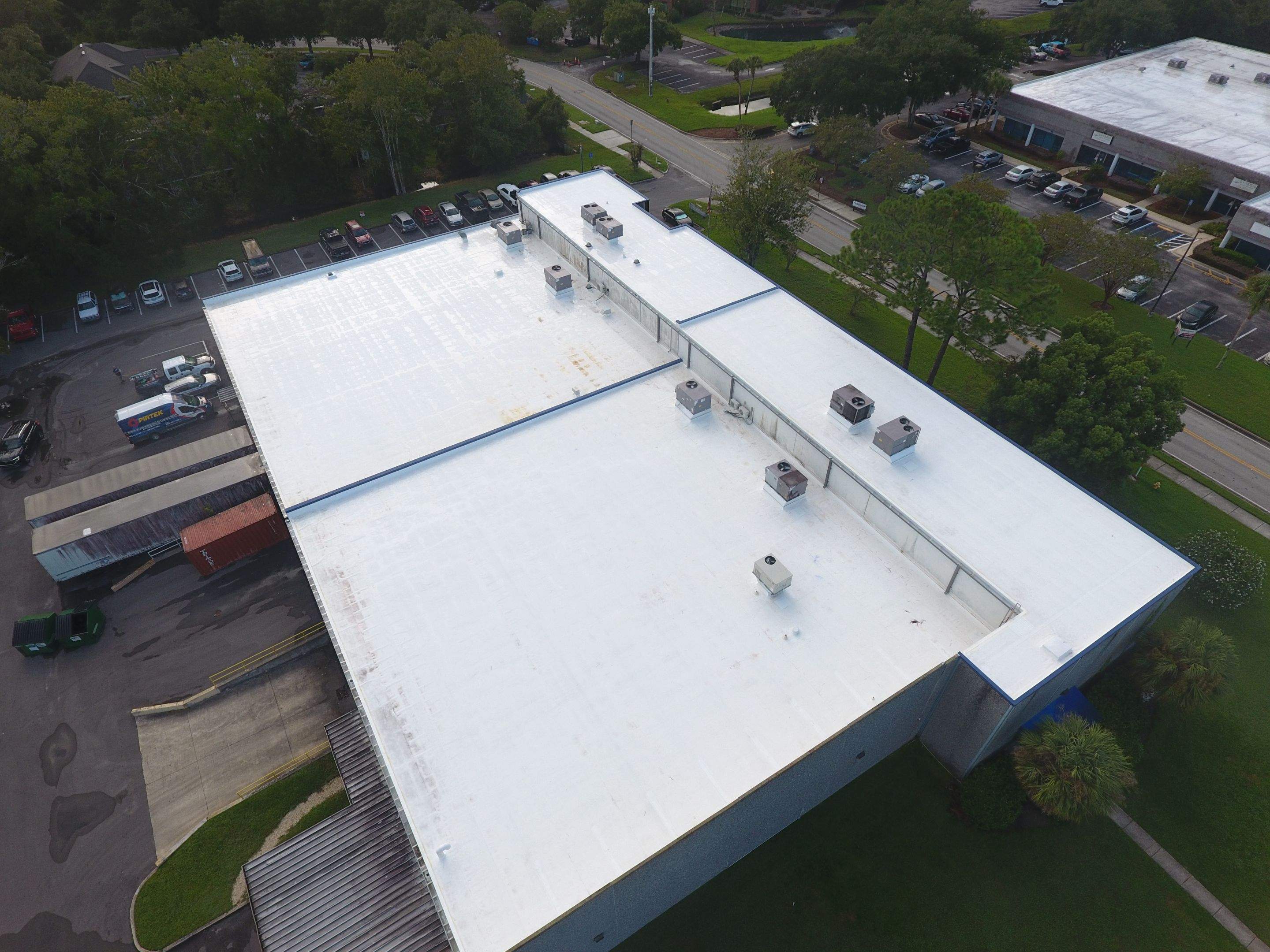 Jacksonville Flat Roof Recovery With TPO Membrane and 10" Box Gutters by MAX (Maximum Asset eXtention)