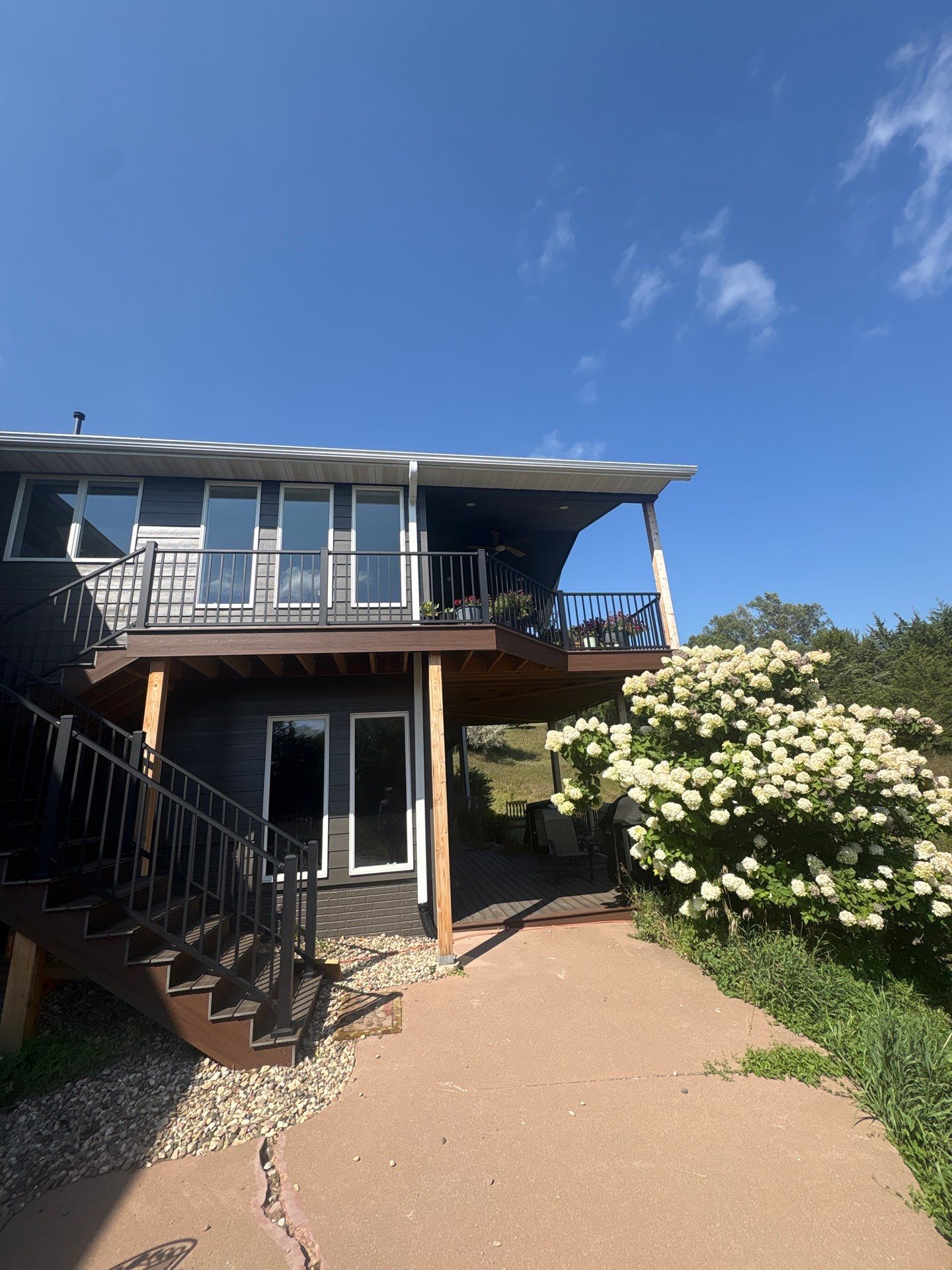 Sioux Falls Residential Exterior Painting and Siding Refresh by Select Painting, Coatings & Garage Cabinets