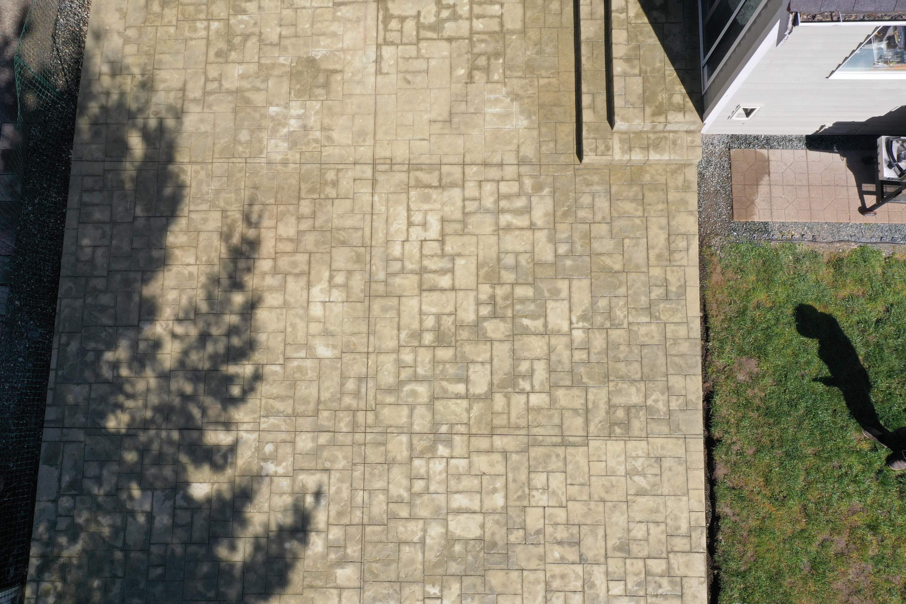 Benedict | Stamped Concrete Back Patio by Jireh Asphalt & Concrete Inc 