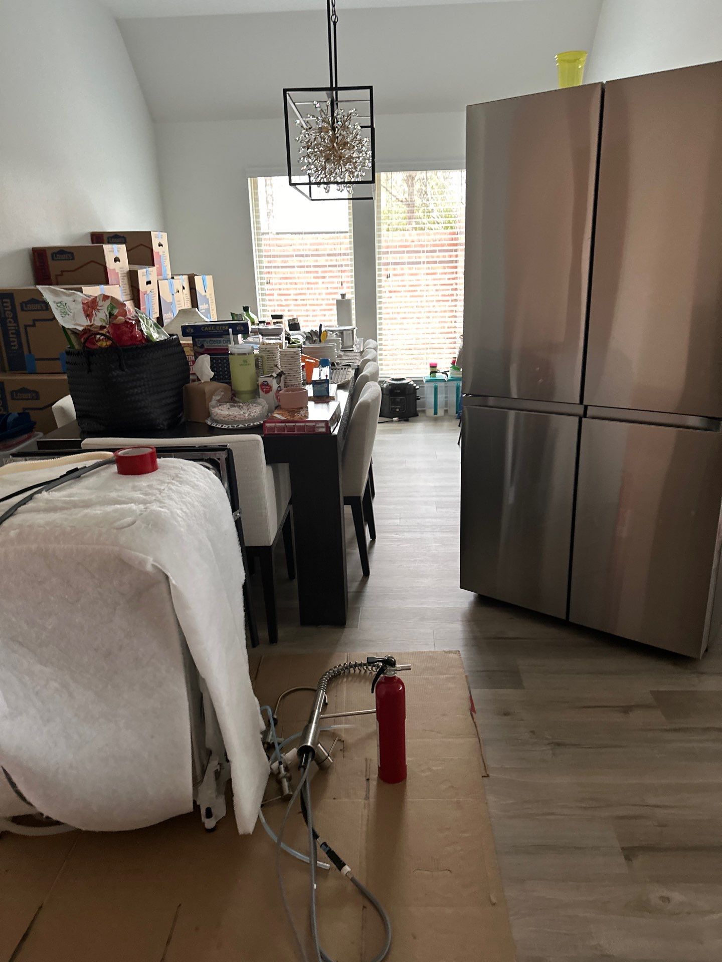 Kitchen Remodel using Water mitigation equipment by L&T General Contractors and Restoration INC