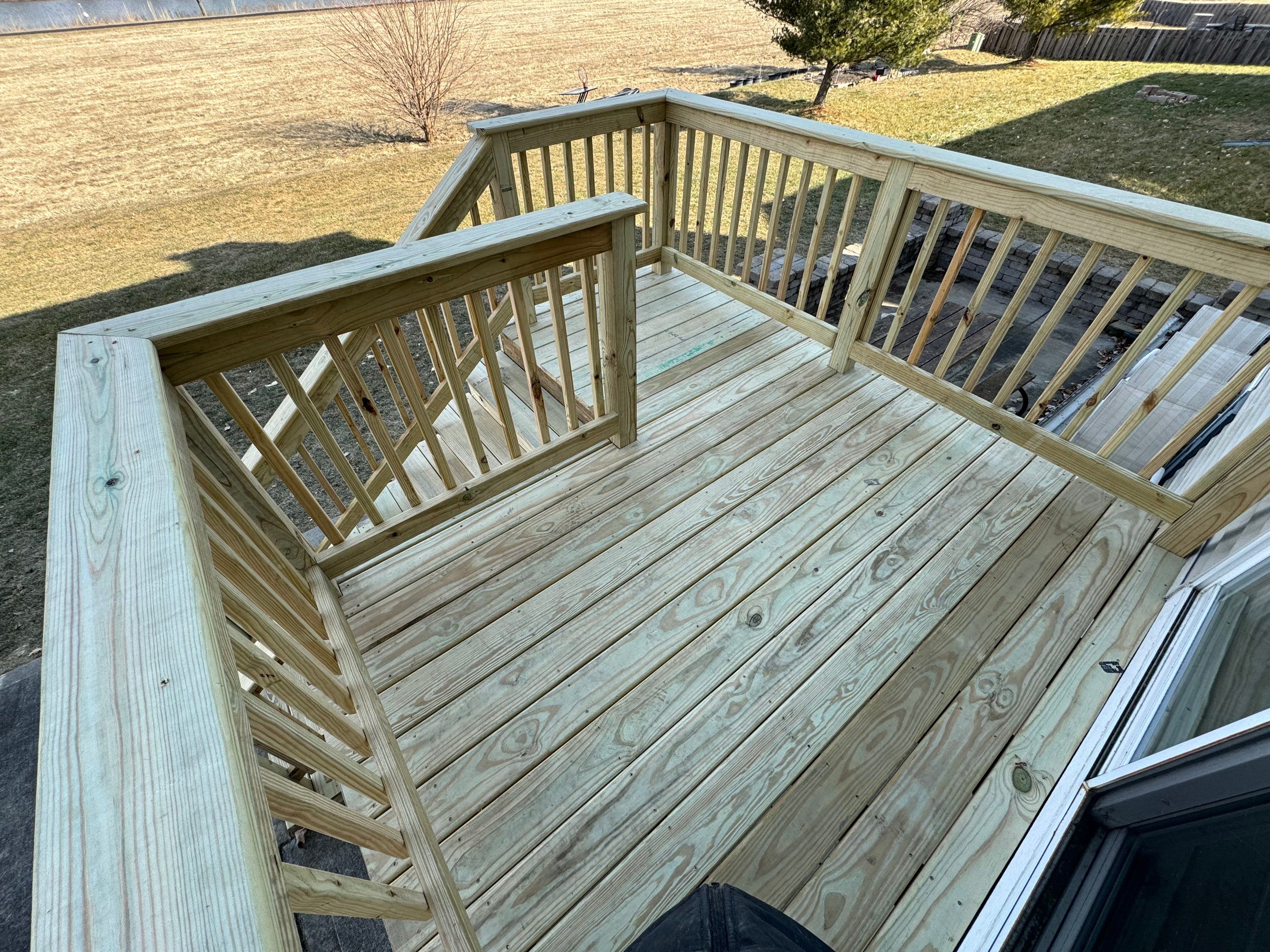 Deck Resurface with Treated SYP by Two Brothers Residential Maintenance