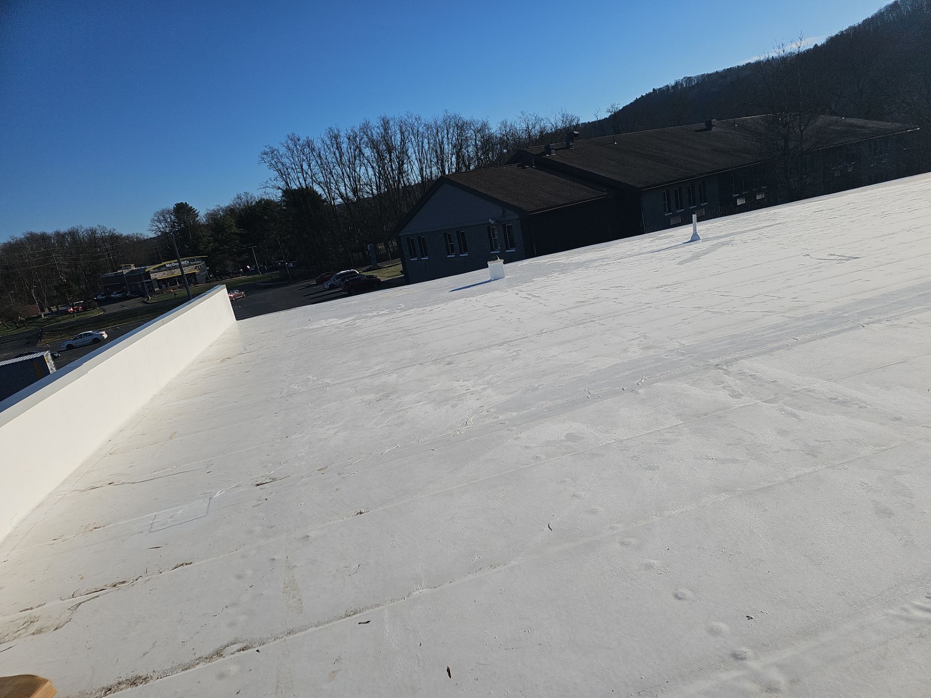 Commercial Roofing Installation using Insulated roof and wall panels by Nitro Roofing and Construction