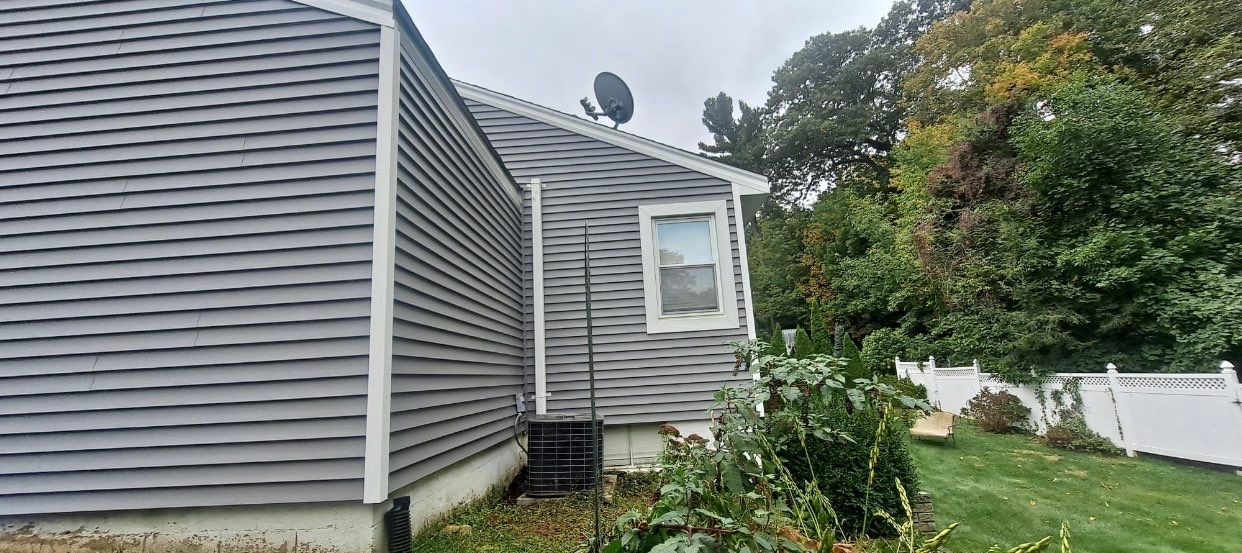 Siding Installation using CertainTeed monogram 4" double 4 Charcoal Gray by A Plus Exterior