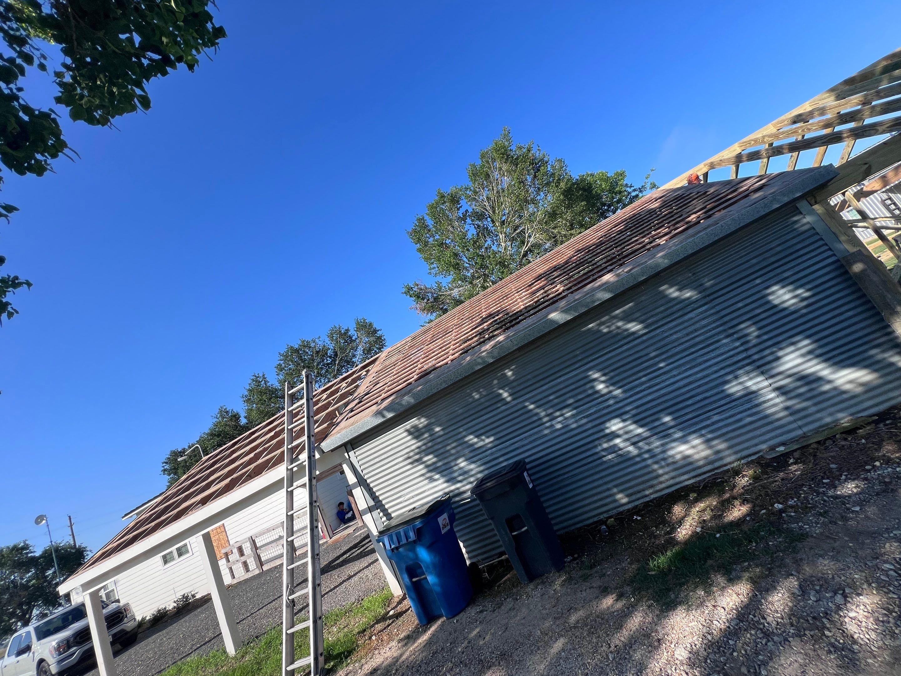 Residential Roofing Installation using Metal by Roof Repair Company