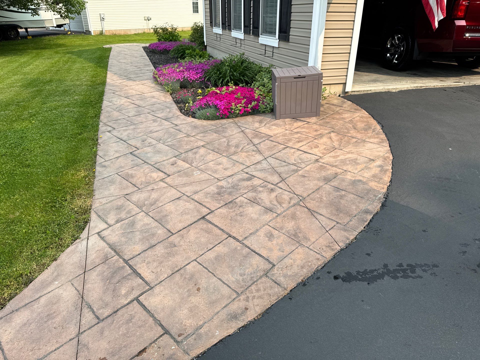 Sidewalk and pool patio Recolor/Reseal  by NG Masonry & Construction LLC