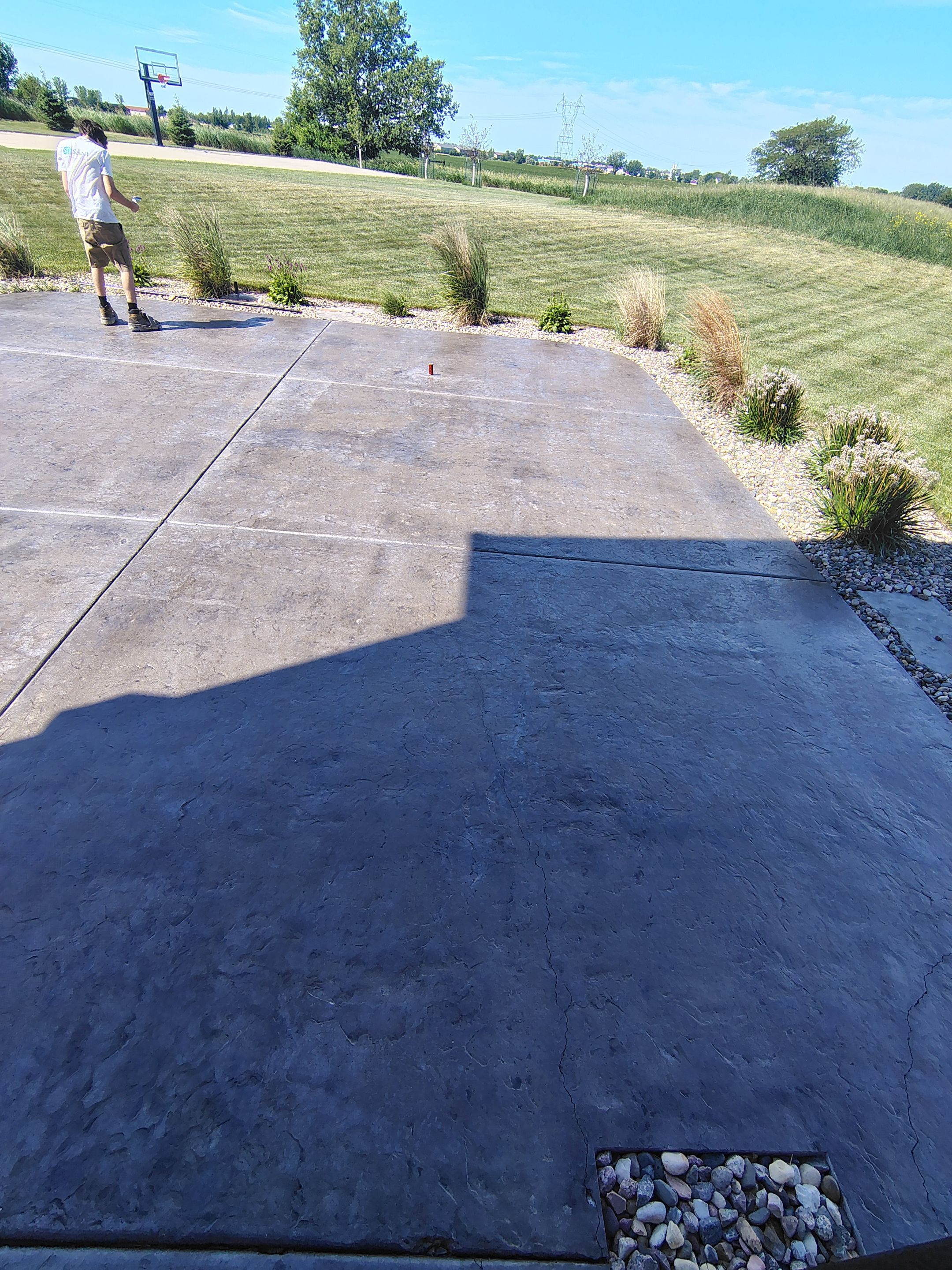 Concrete Patio Restoration and Installation in Sioux Falls by Select Painting, Coatings & Garage Cabinets