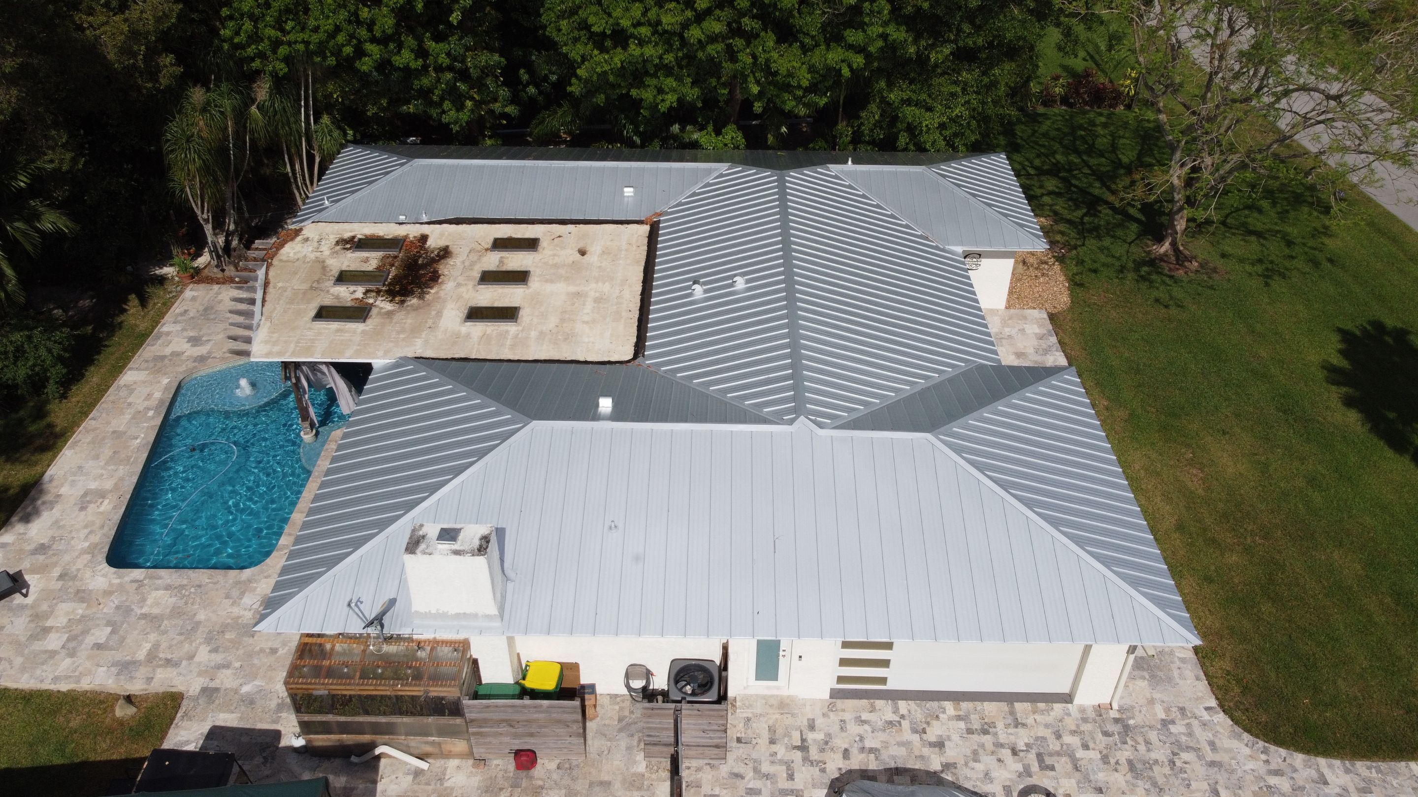 Residential Roofing Installation using 1" Nail strip metal roof by BLUES BROTHERS ROOFING