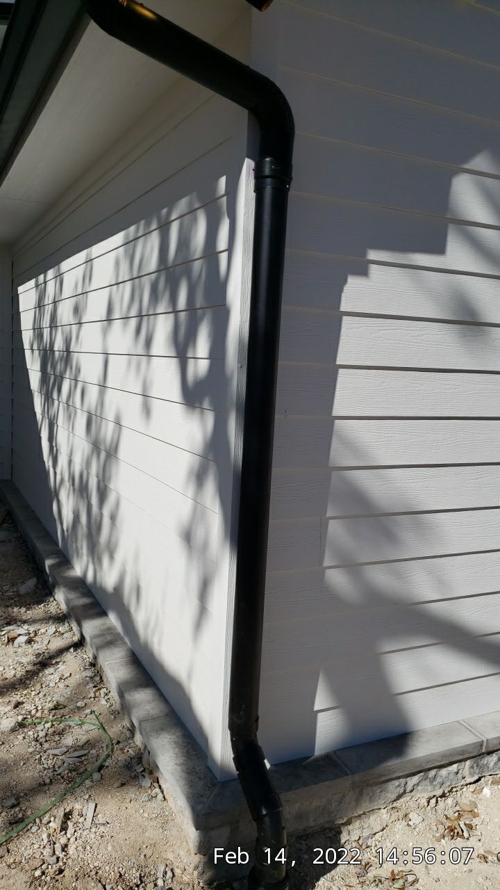 30K gallon mangrove green tank for residential rain water harvesting, Dripping Springs, TX by Hill Country Rain Water