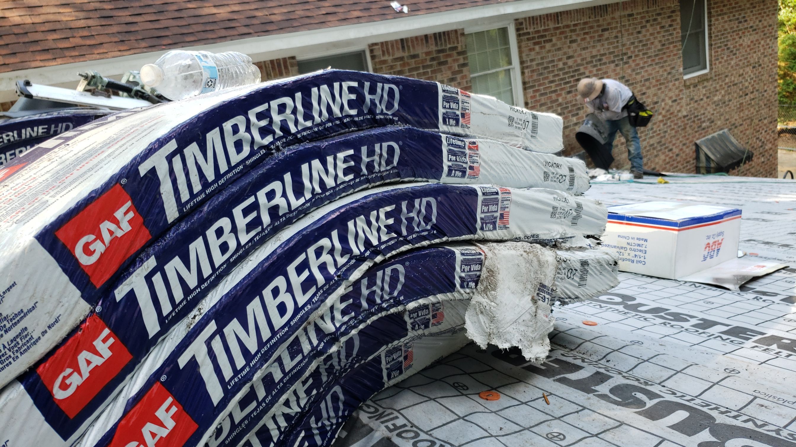Residential Roofing Installation using Roof Replacement by American Roofing & Construction LLC