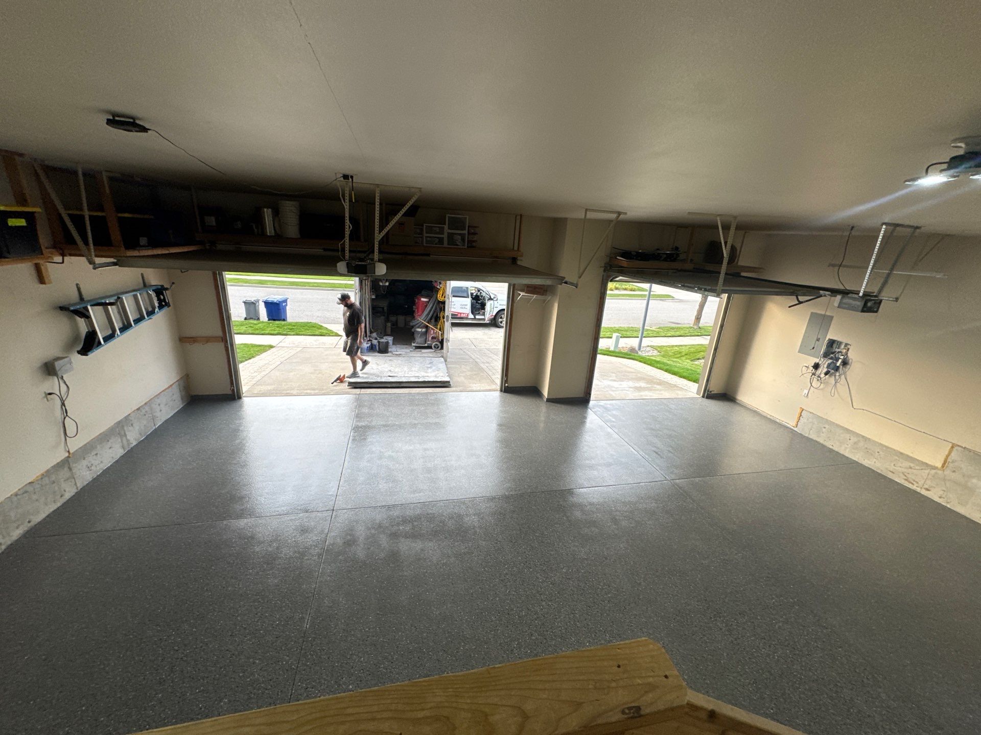 Custom Gray Speckled Polyaspartic Garage Floor Coating in Cheney by Croc Coatings, LLC