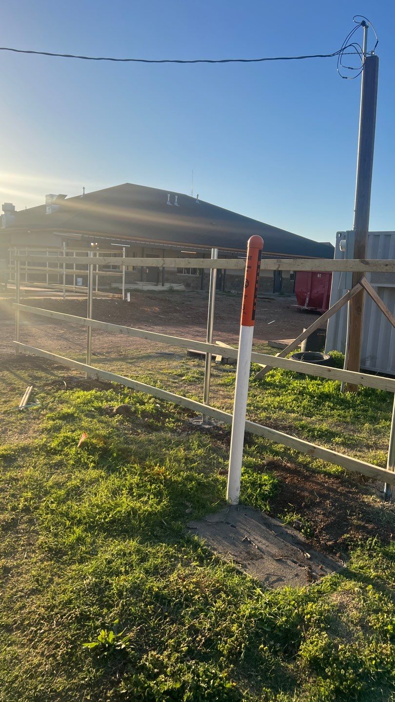 Cedar Fence using Cedar Pickets and Metal Poles by Clays Services Inc