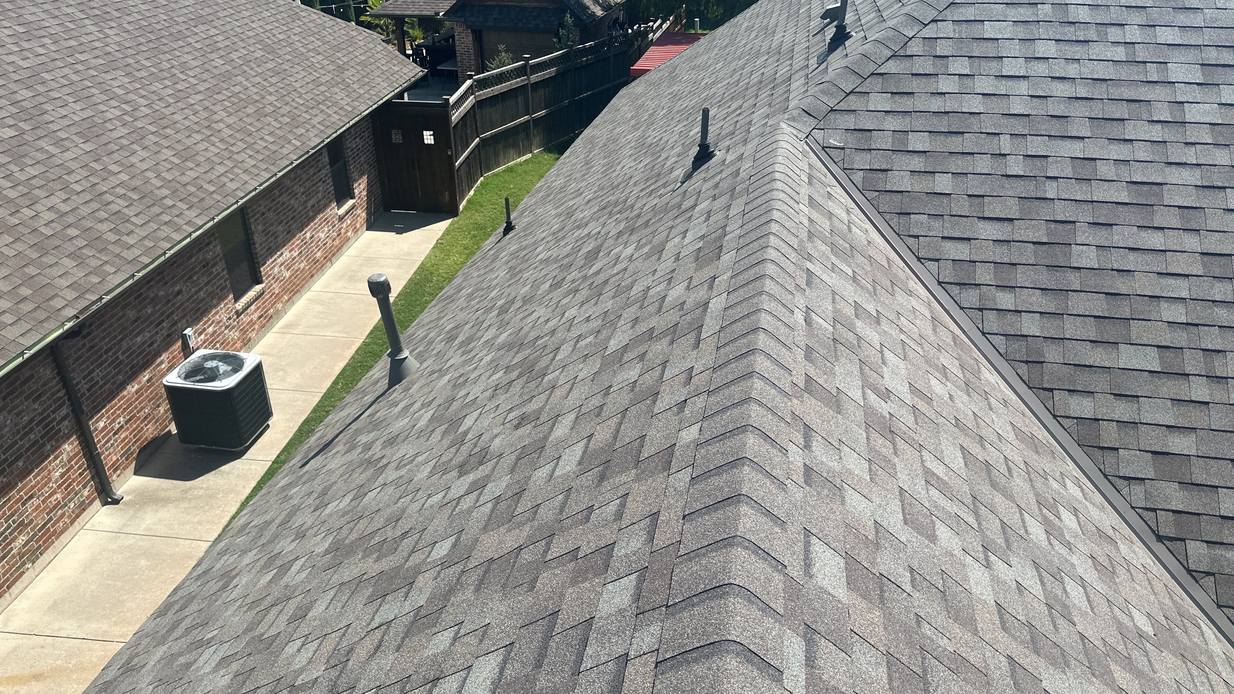 Reroof using Owens Corning Duration Storm IR in Driftwood by Castillo Roofing