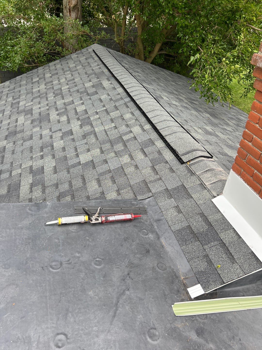 Residential Roofing Installation using 60 mil rubber roof  by Nitro Roofing and Construction