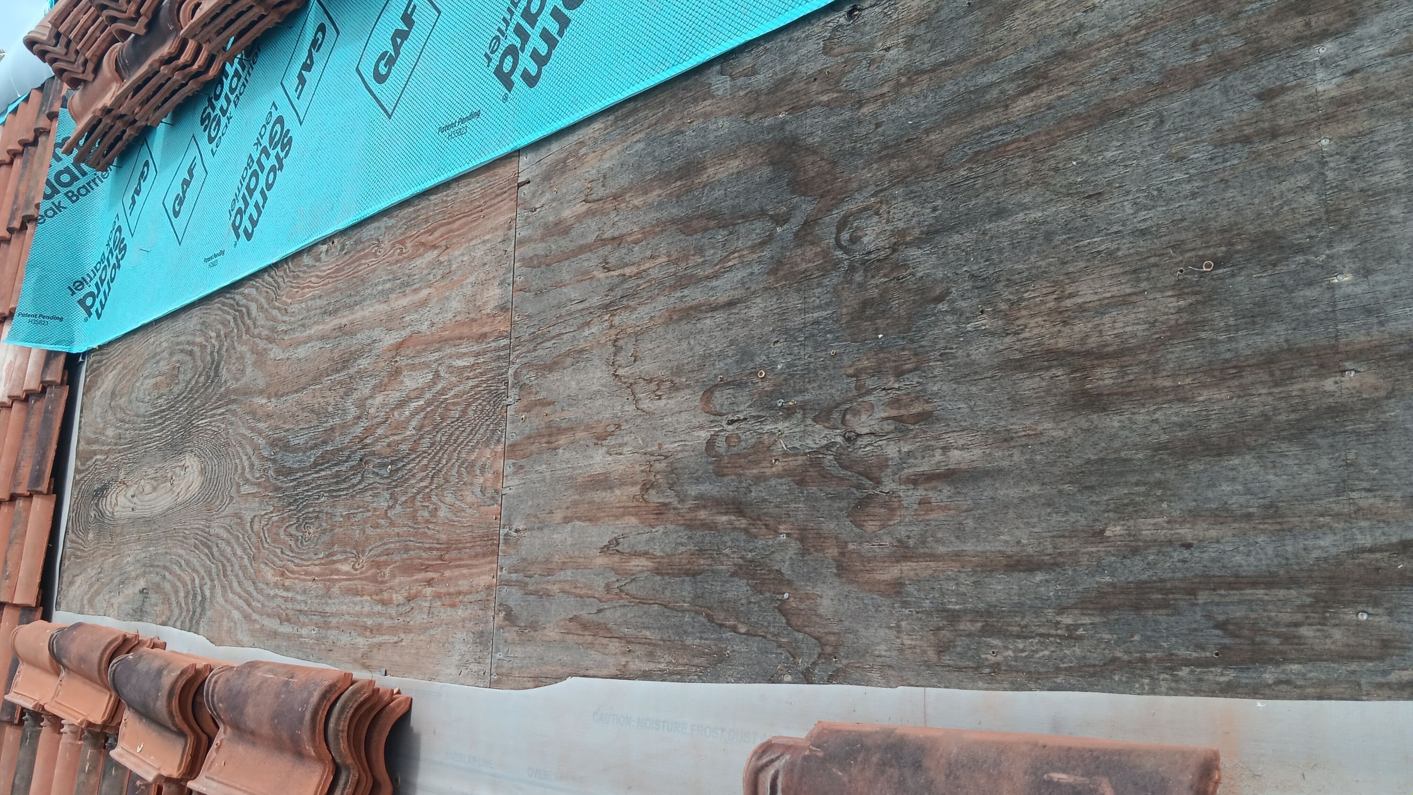 Residential Roofing Repair using tile by Roof Repair Company
