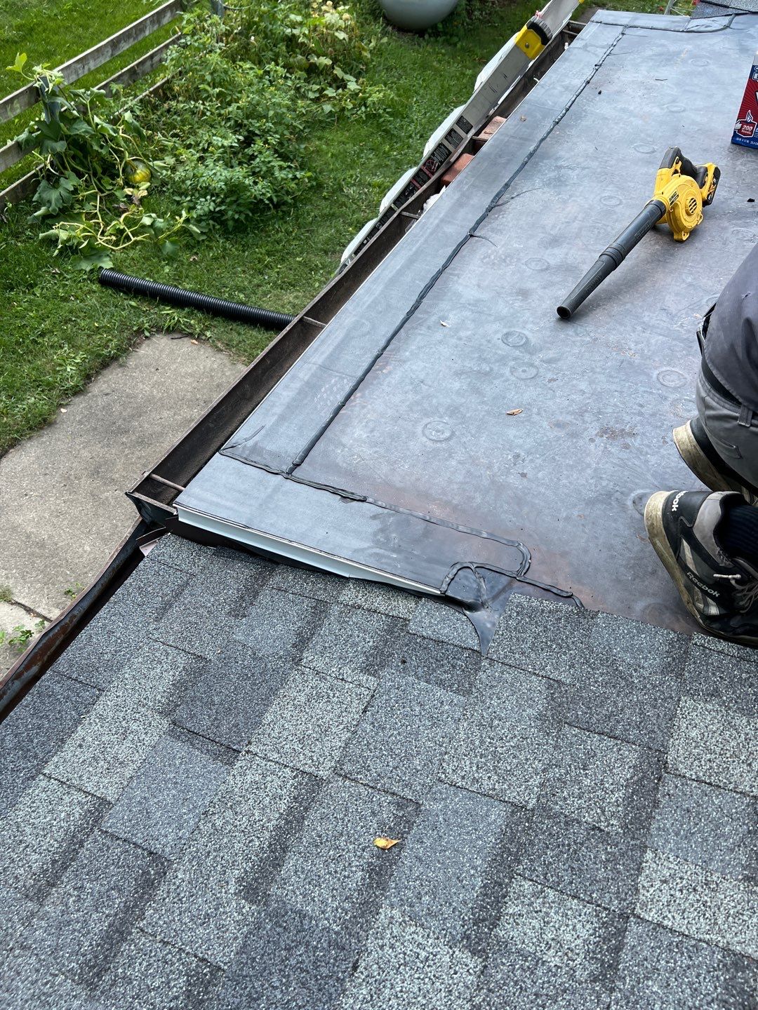 Residential Roofing Installation using 60 mil rubber roof  by Nitro Roofing and Construction