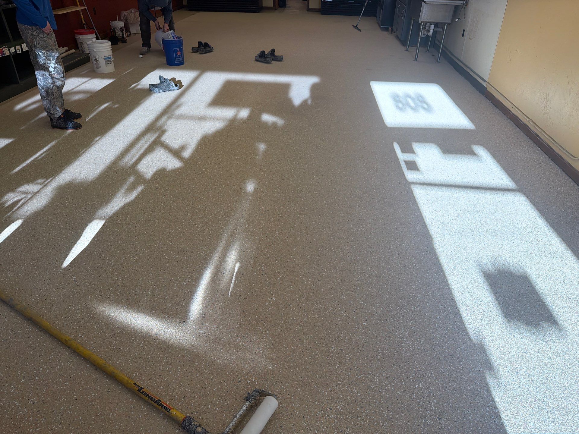 Epoxy Flooring Installation – Downtown Muskegon Commercial Space by Gordon Painting
