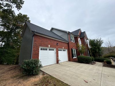 Exterior Painting and Siding Refresh for Woodstock Residential Home