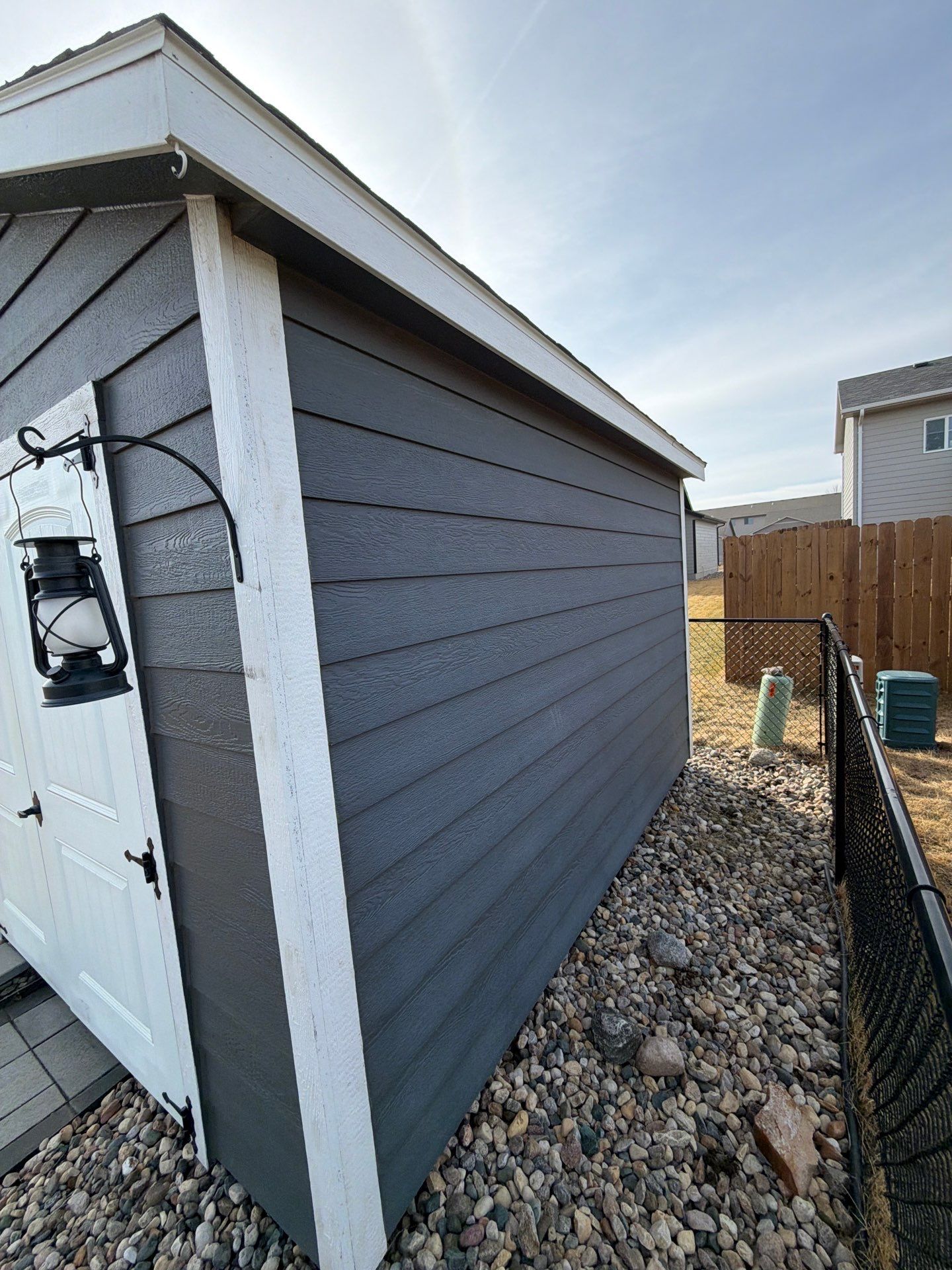 Residential Exterior Painting and Siding Refresh in Sioux Falls by Select Painting, Coatings & Garage Cabinets