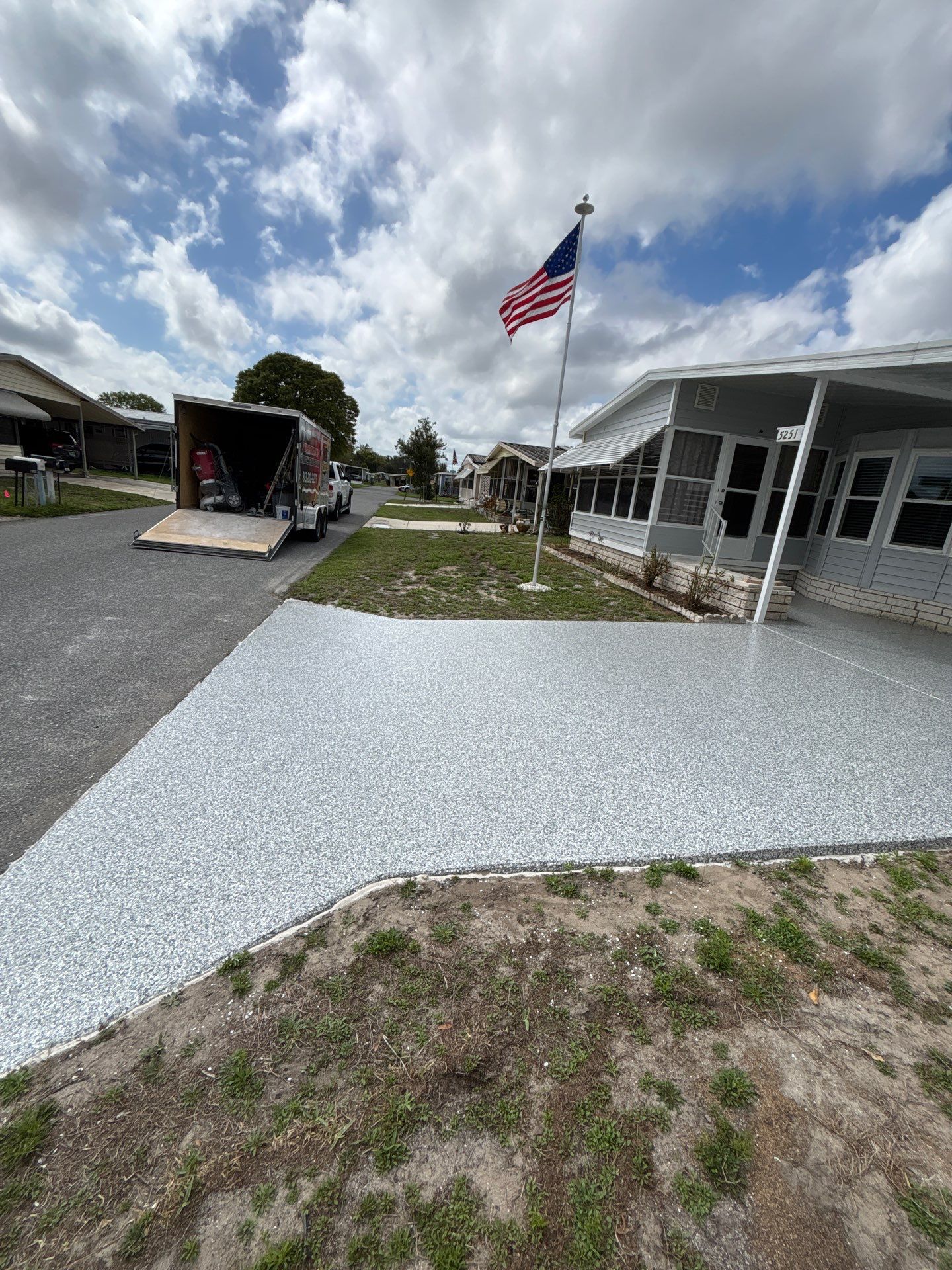 Driveway Floor Coating Using Gravel Flake by Performance Floors & Coating