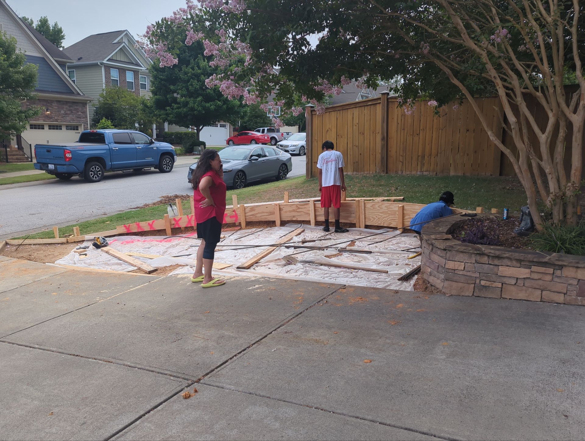 Concrete Driveway Expansion & Retaining Wall | Apex, NC by Elite Remodeling and Design LLC