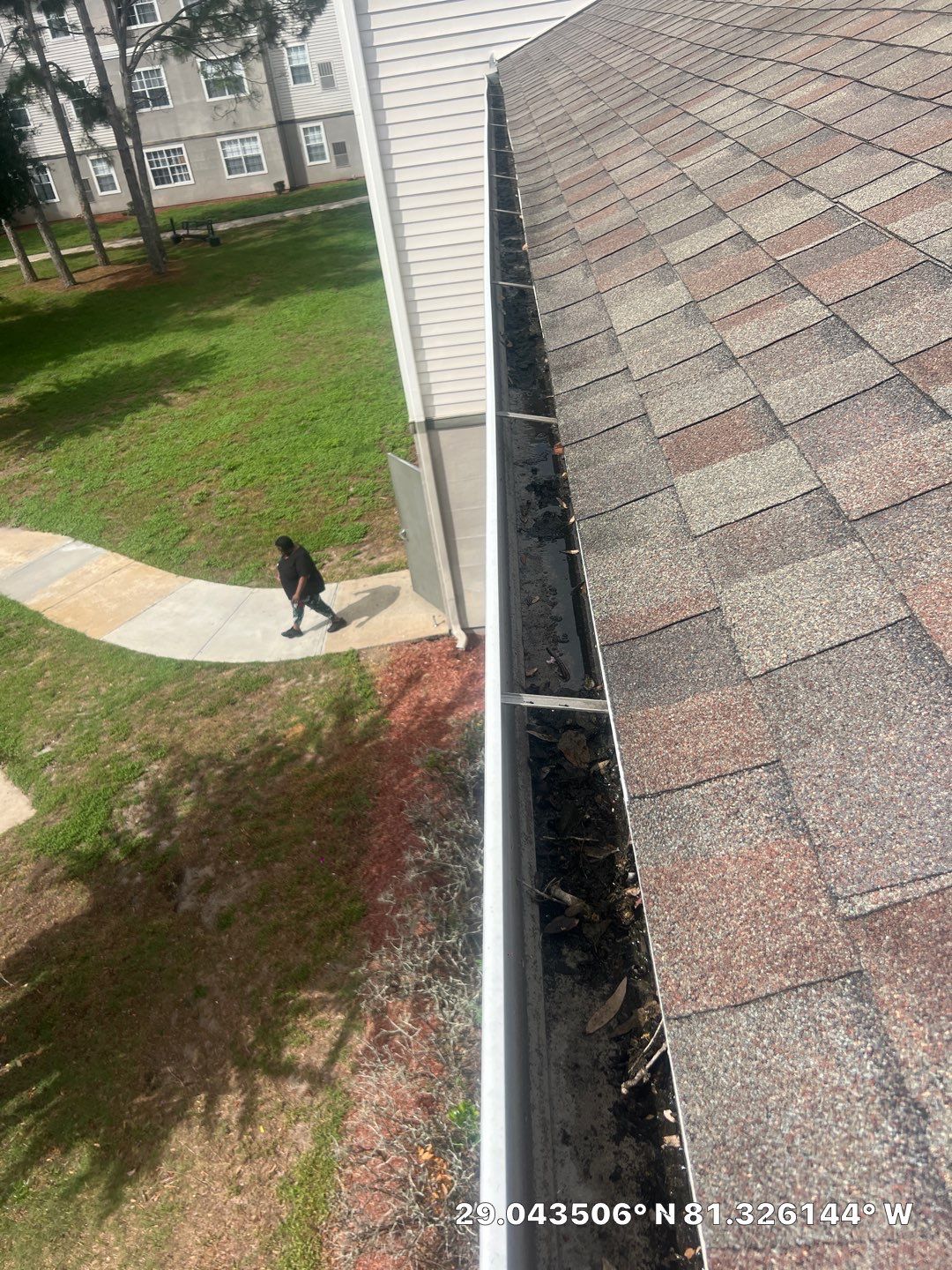 HOA gutter cleaning before photo.