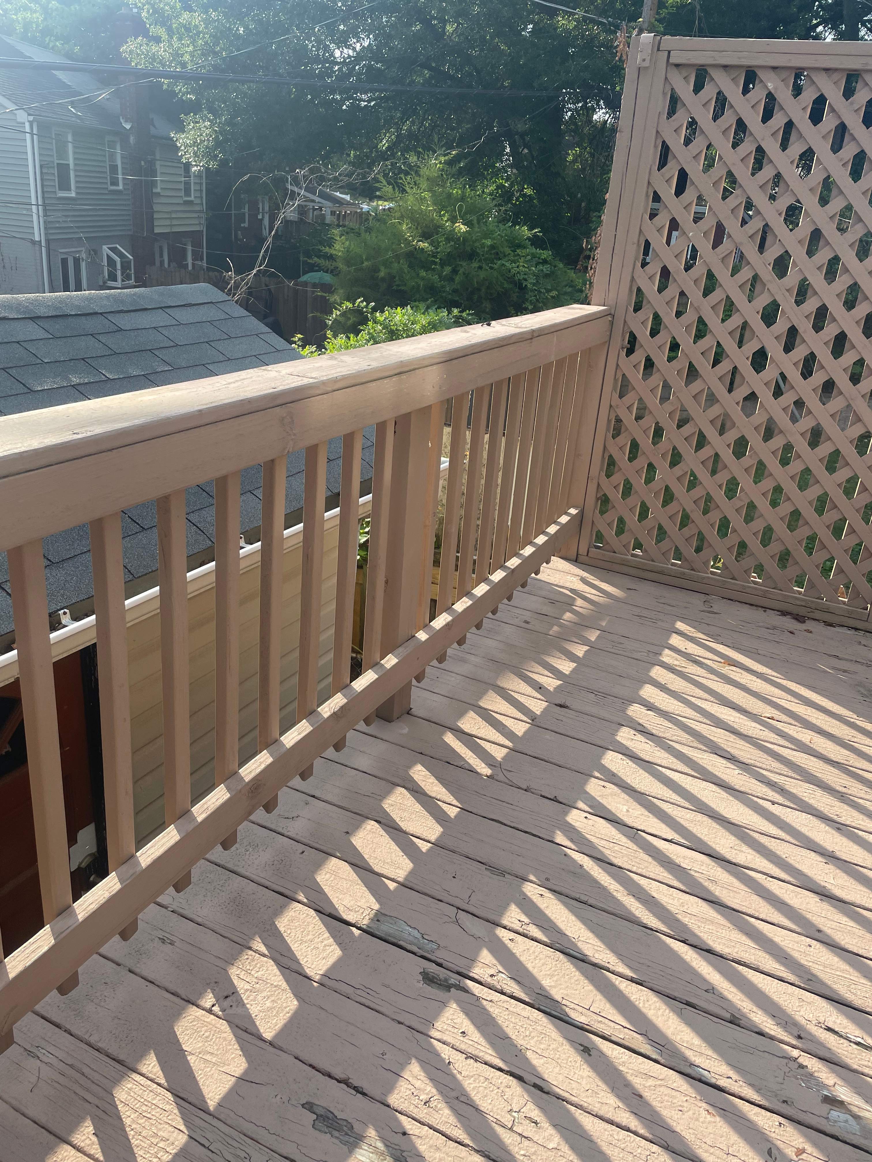 Deck resurfacing, railing replacement and concrete resurfacing by Fairfax Contractors, LLC
