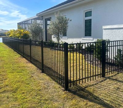 Aluminum Fence Installation using Black 3 Rail Aluminum Fence