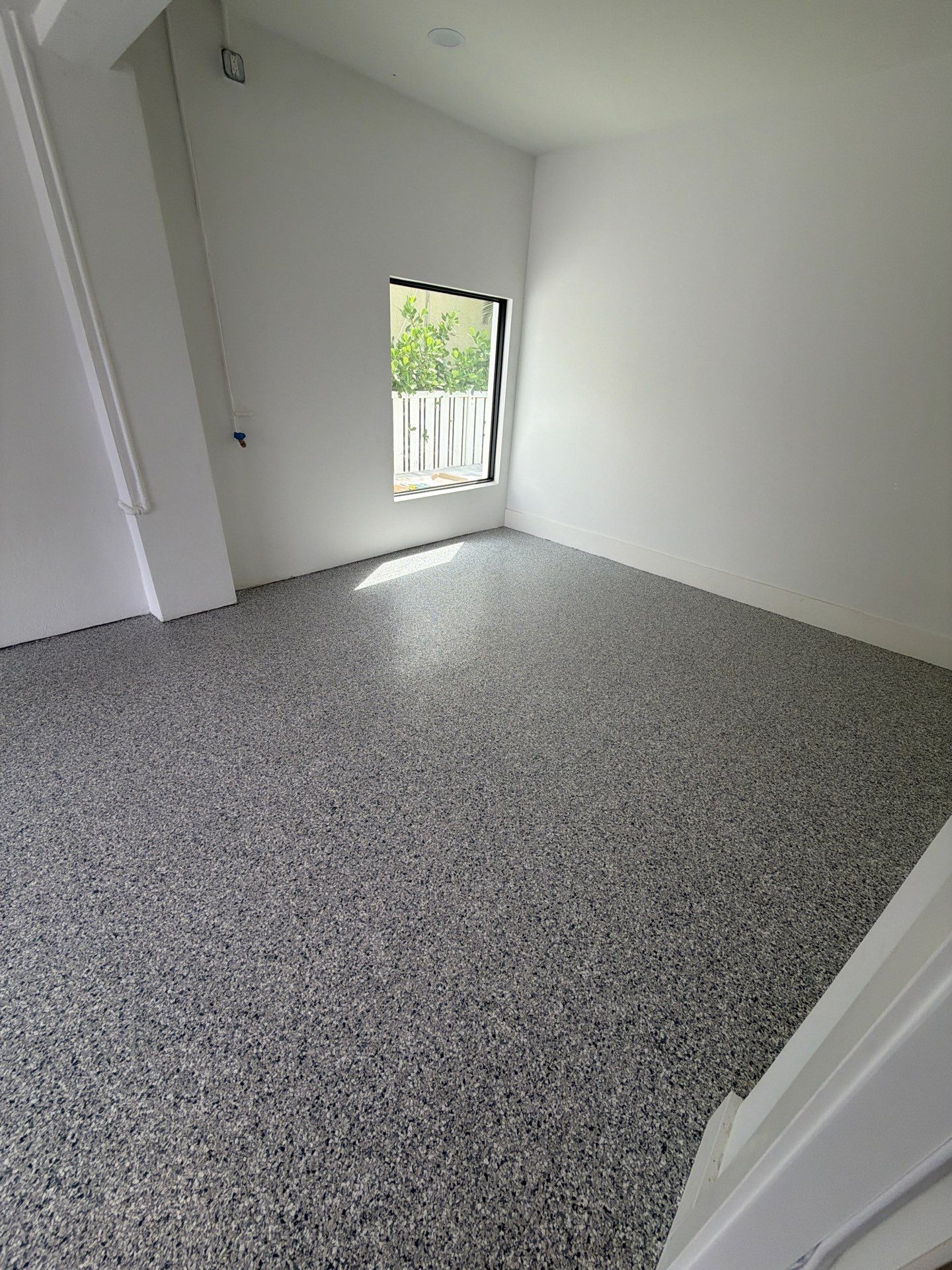 Residential Garage Floor Preparation and Epoxy Coating in Dunedin by Performance Floors & Coating