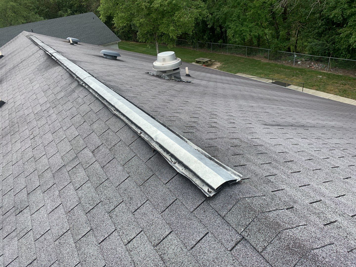 Re Roof  by American Roofing NC