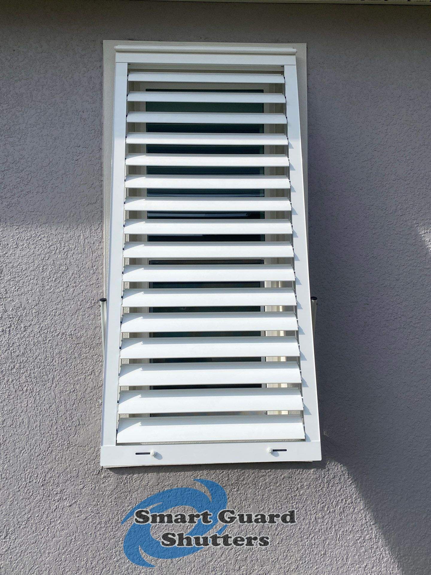 Impact Bahamas in Signal White by Smart Guard Shutters