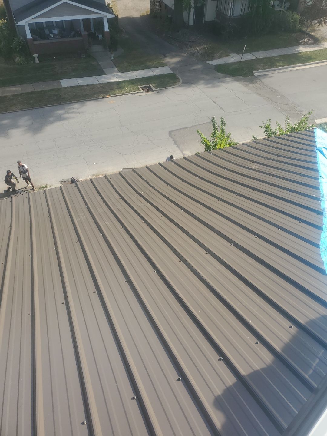 Roof Replacement using Metal by Rainstoppers Roofing