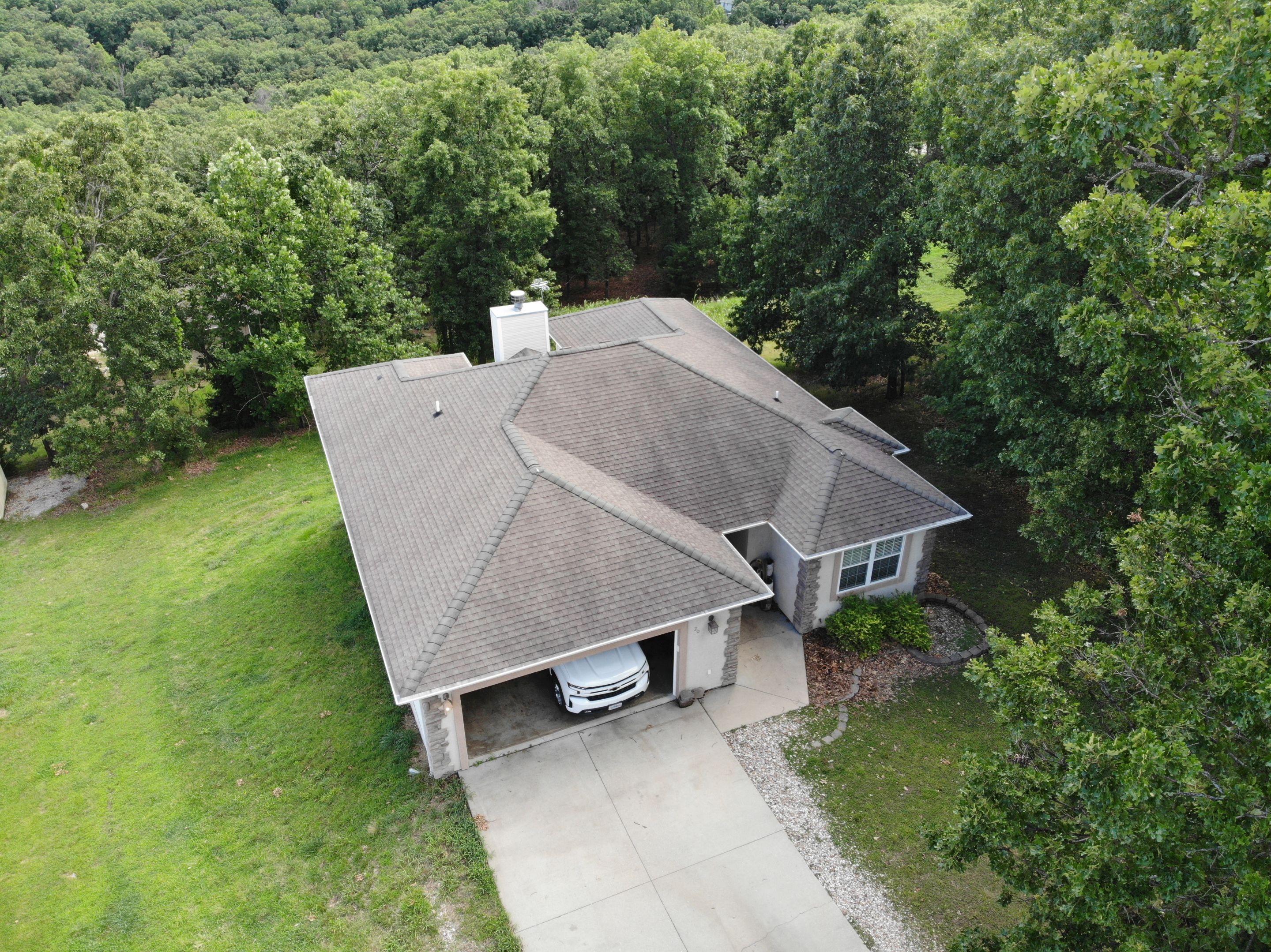 Residential Roofing Install - Atlas Pinnacle Pristine W/ Scotchguard Shingles - Color Weathered Wood  by Titan Commercial & Residential Roofing 