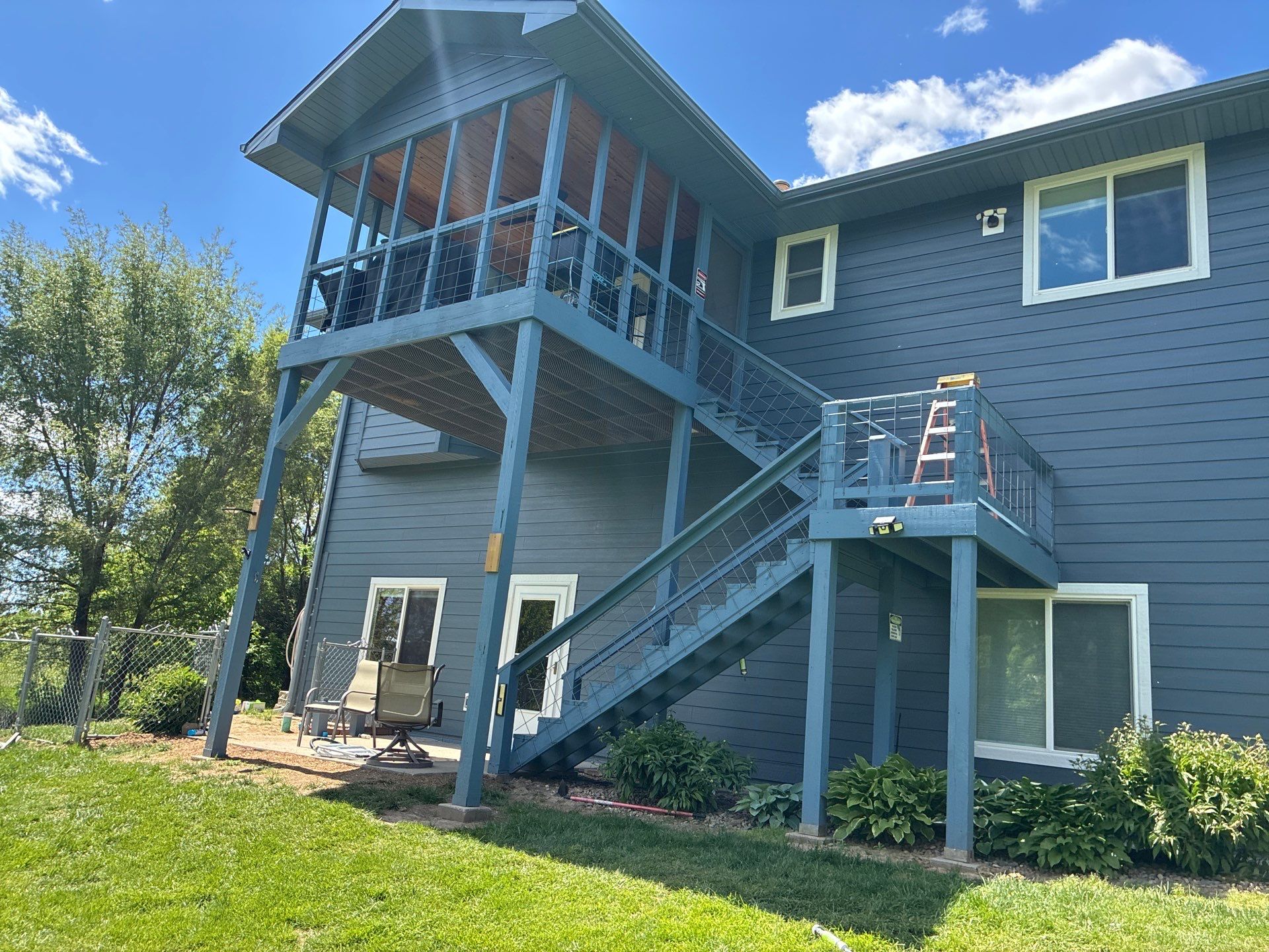 Evening Blue Siding and Window Replacement in Glenwood, Iowa by Carps Complete Exteriors 