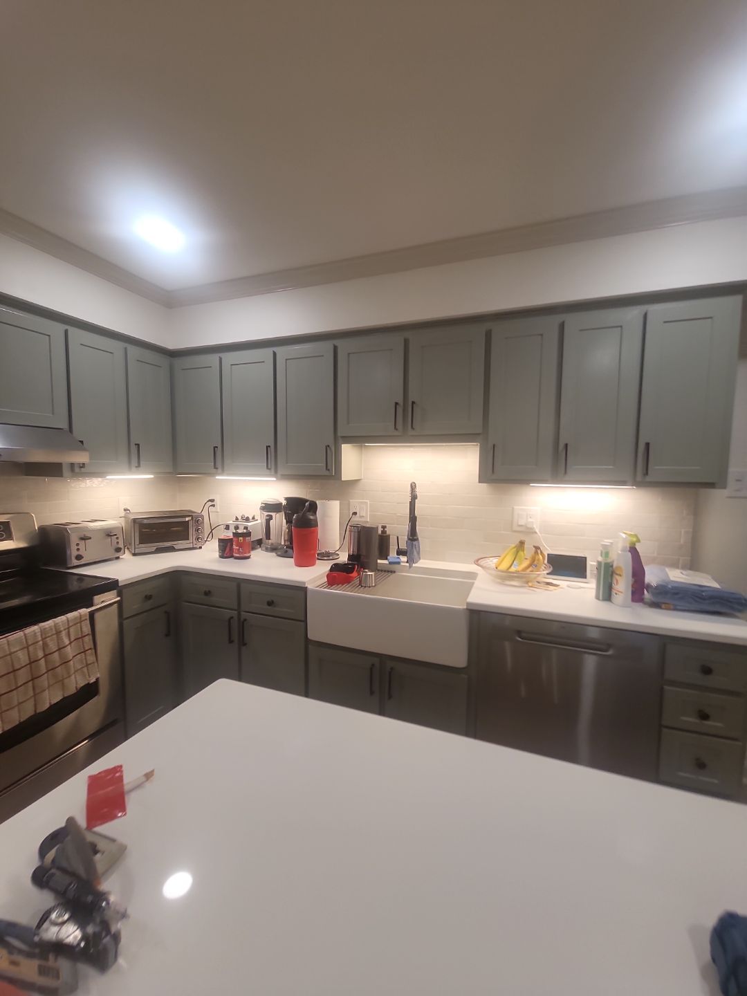 A Pathway to Personality – A Two-Tone Kitchen Transformation in Apex by Elite Remodeling and Design LLC