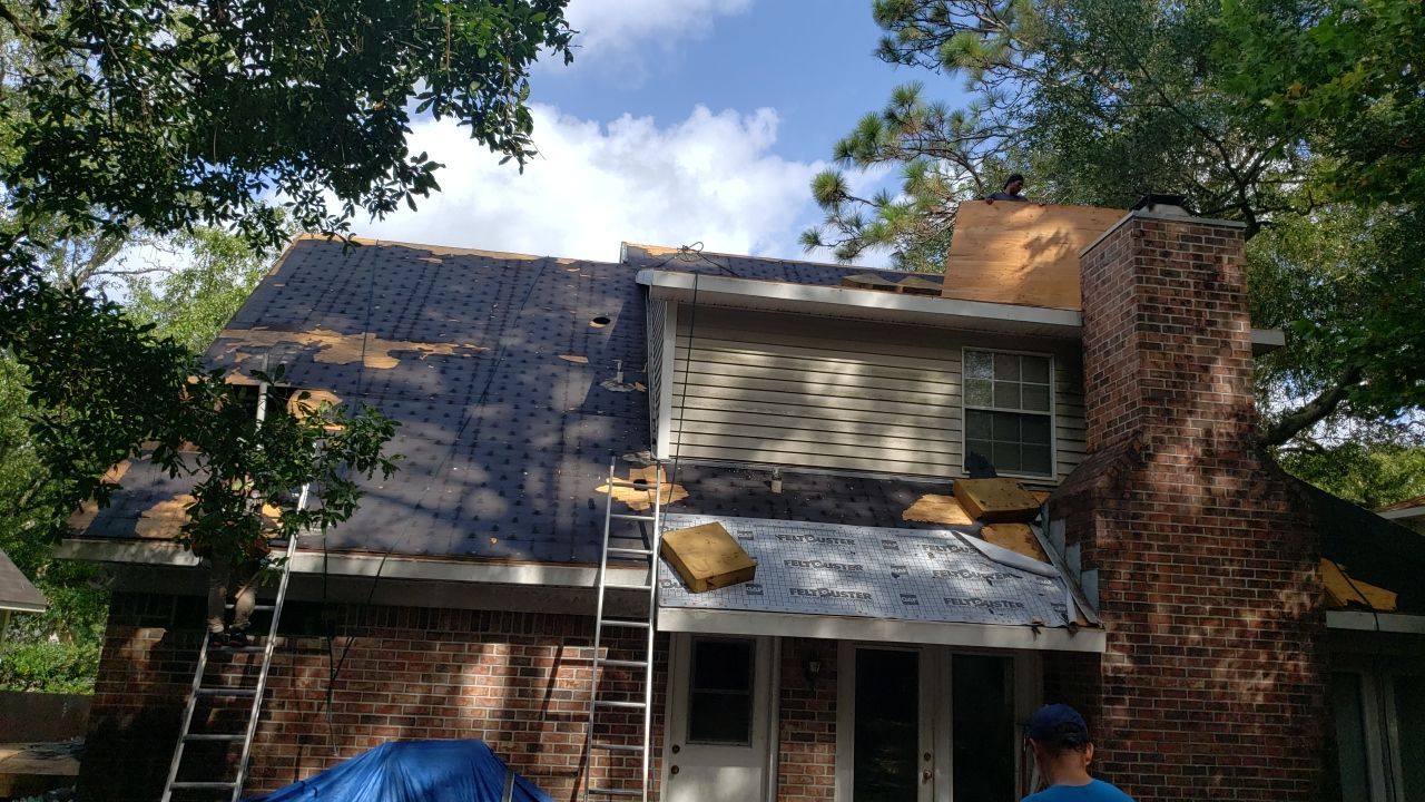 Residential Roofing Installation using Roof Replacement by American Roofing & Construction LLC