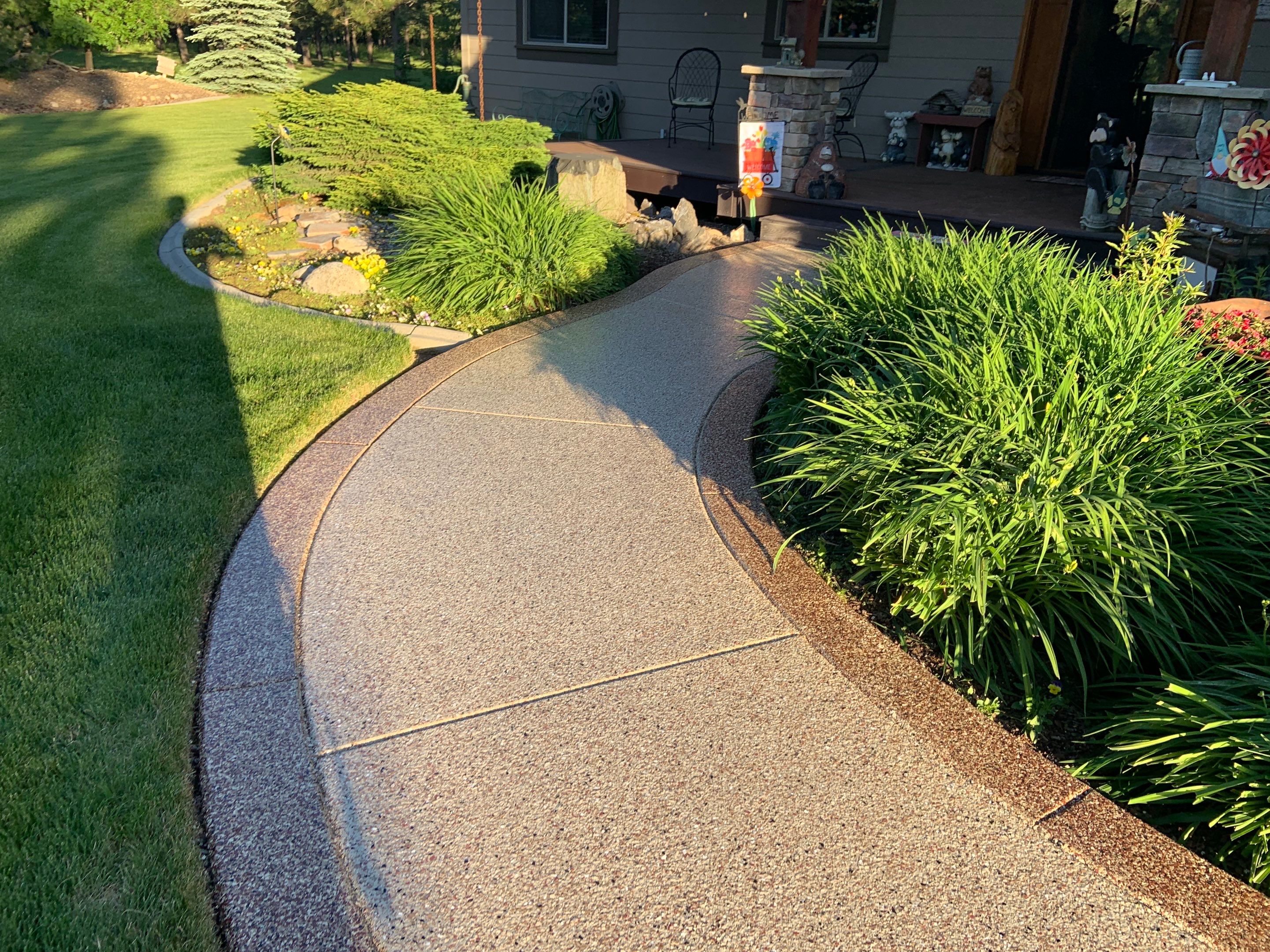 Driveway using Pecan and Chestnut Trim by Croc Coatings, LLC